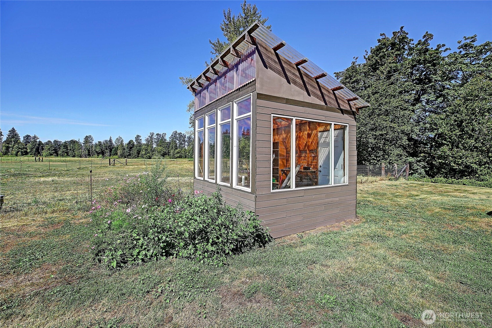12631 State Rte 530 Northeast Arlington, WA 98223 - Photo 37 of 40 a front view of a house with a yard