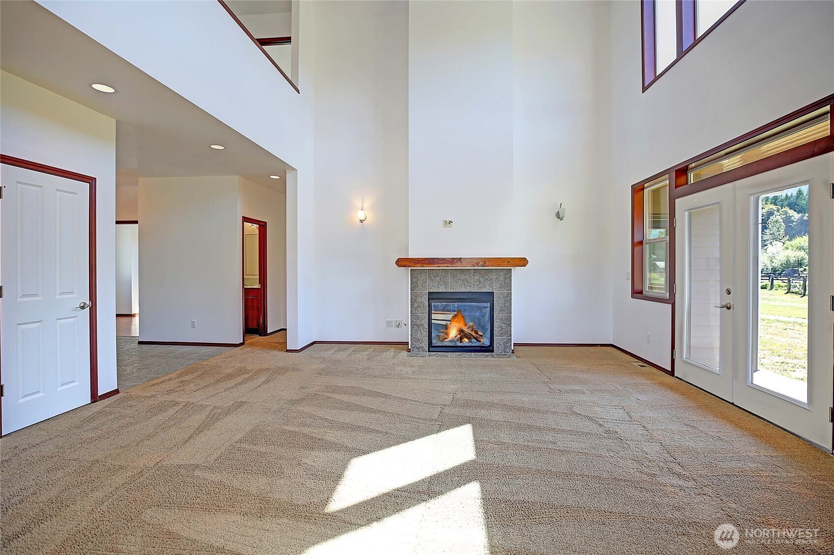 12631 State Rte 530 Northeast Arlington, WA 98223 - Photo 10 of 40 a view of an empty room with a fireplace