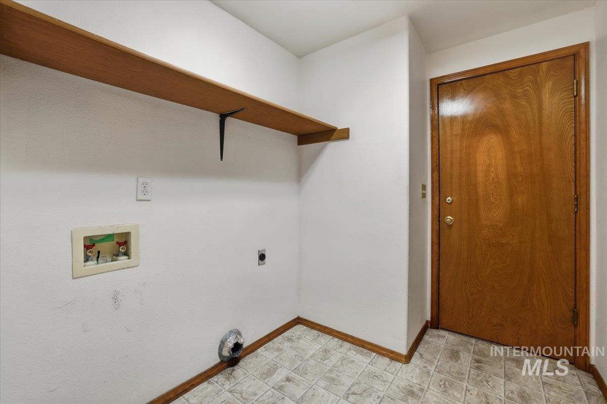 7134 West Amity Road Boise, ID 83709 - Photo 8 of 20 Laundry room featuring washer hookup and hookup for an electric dryer
