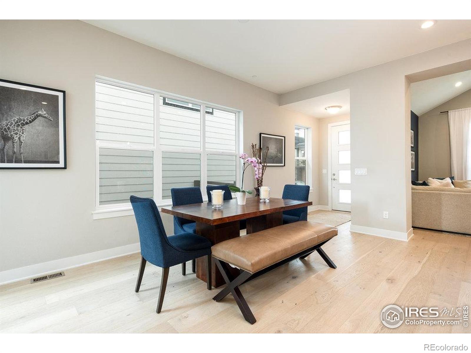 730 Promenade Drive Superior, CO 80027 - Photo 24 of 50 a living room with furniture and a large window