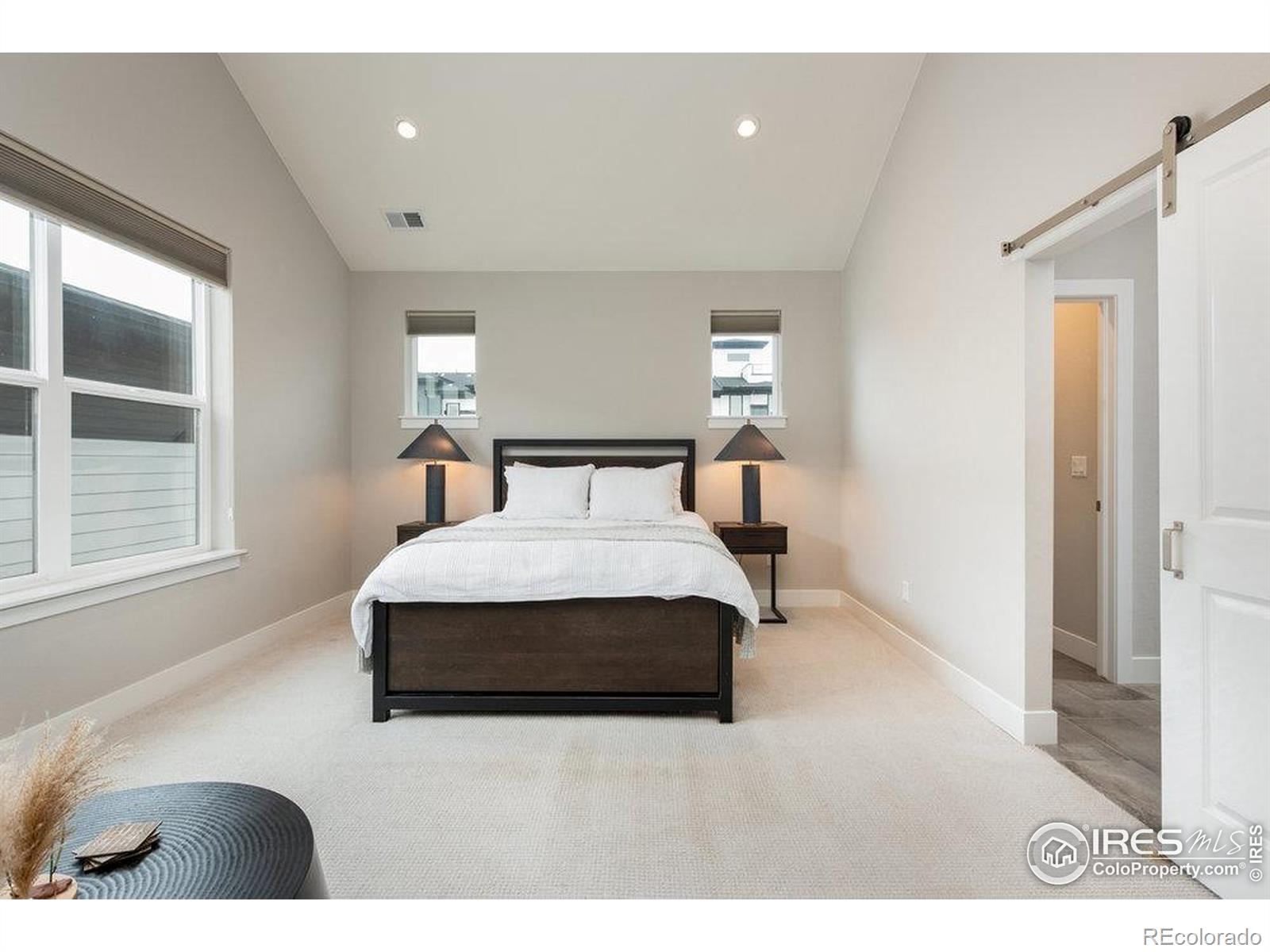 730 Promenade Drive Superior, CO 80027 - Photo 27 of 50 a bedroom with a bed and window