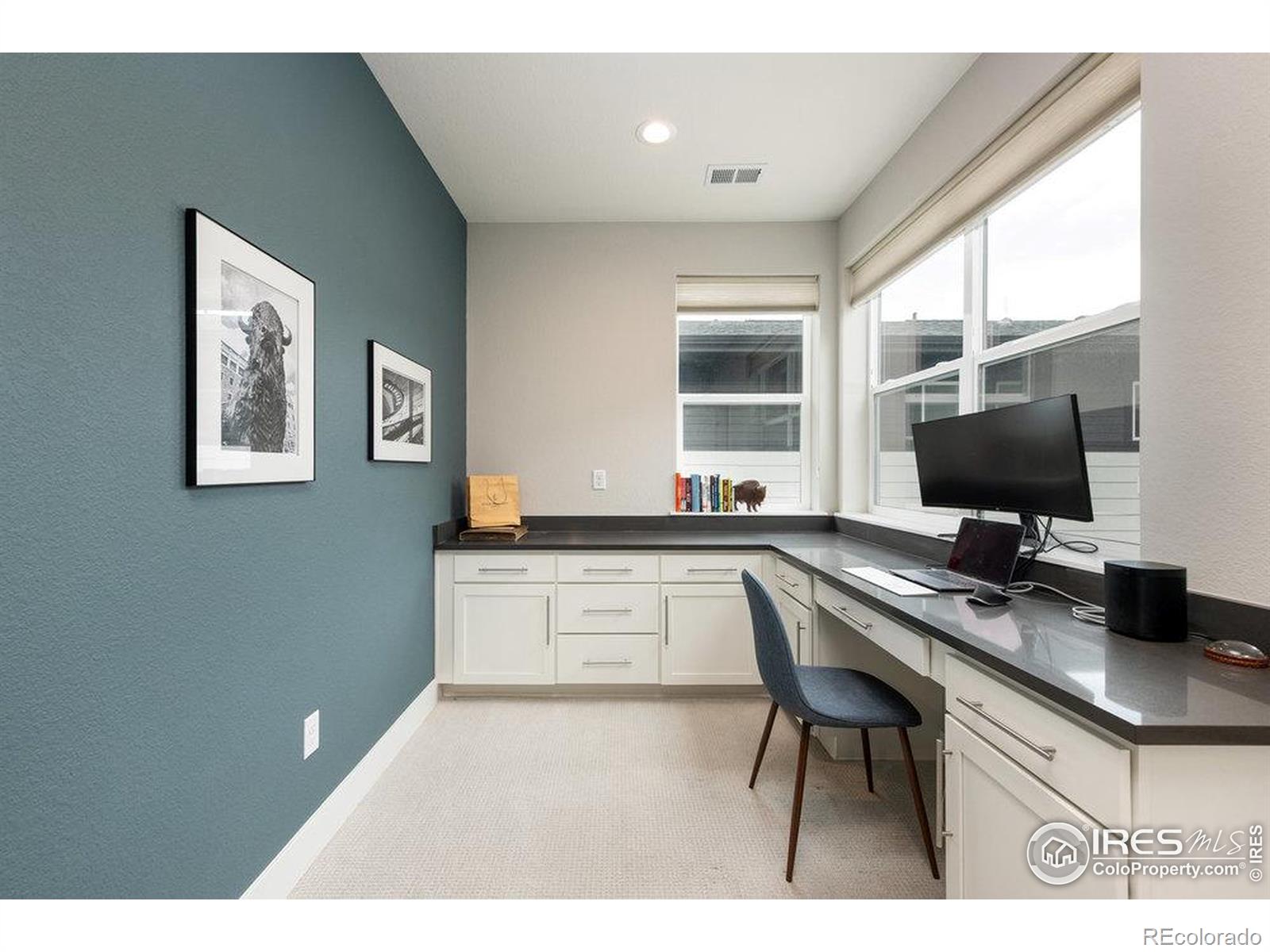 730 Promenade Drive Superior, CO 80027 - Photo 34 of 50 a kitchen with a sink cabinets and window