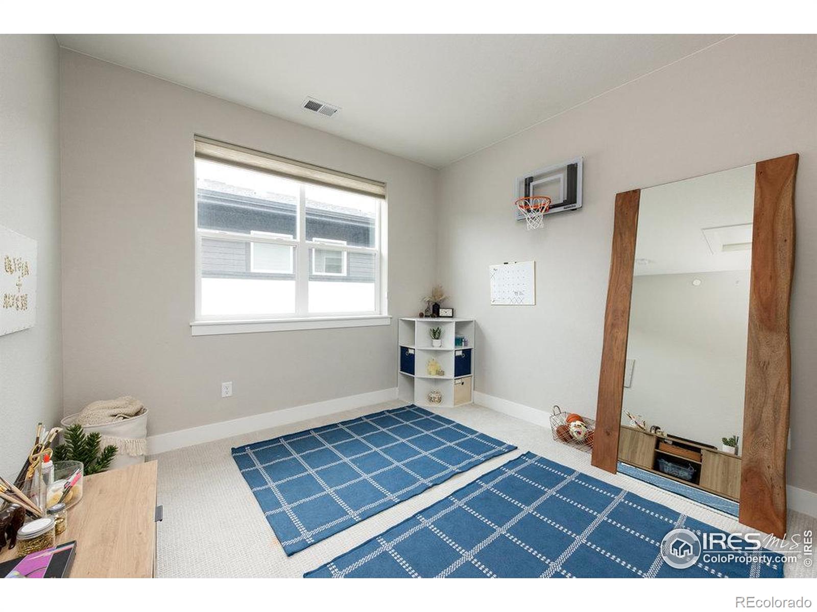 730 Promenade Drive Superior, CO 80027 - Photo 38 of 50 a view of an empty room and window