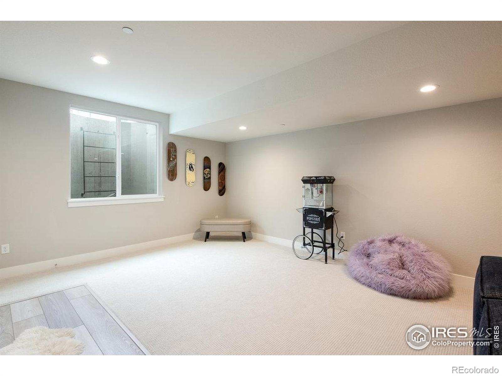 730 Promenade Drive Superior, CO 80027 - Photo 43 of 50 a living room with furniture and a wooden floor