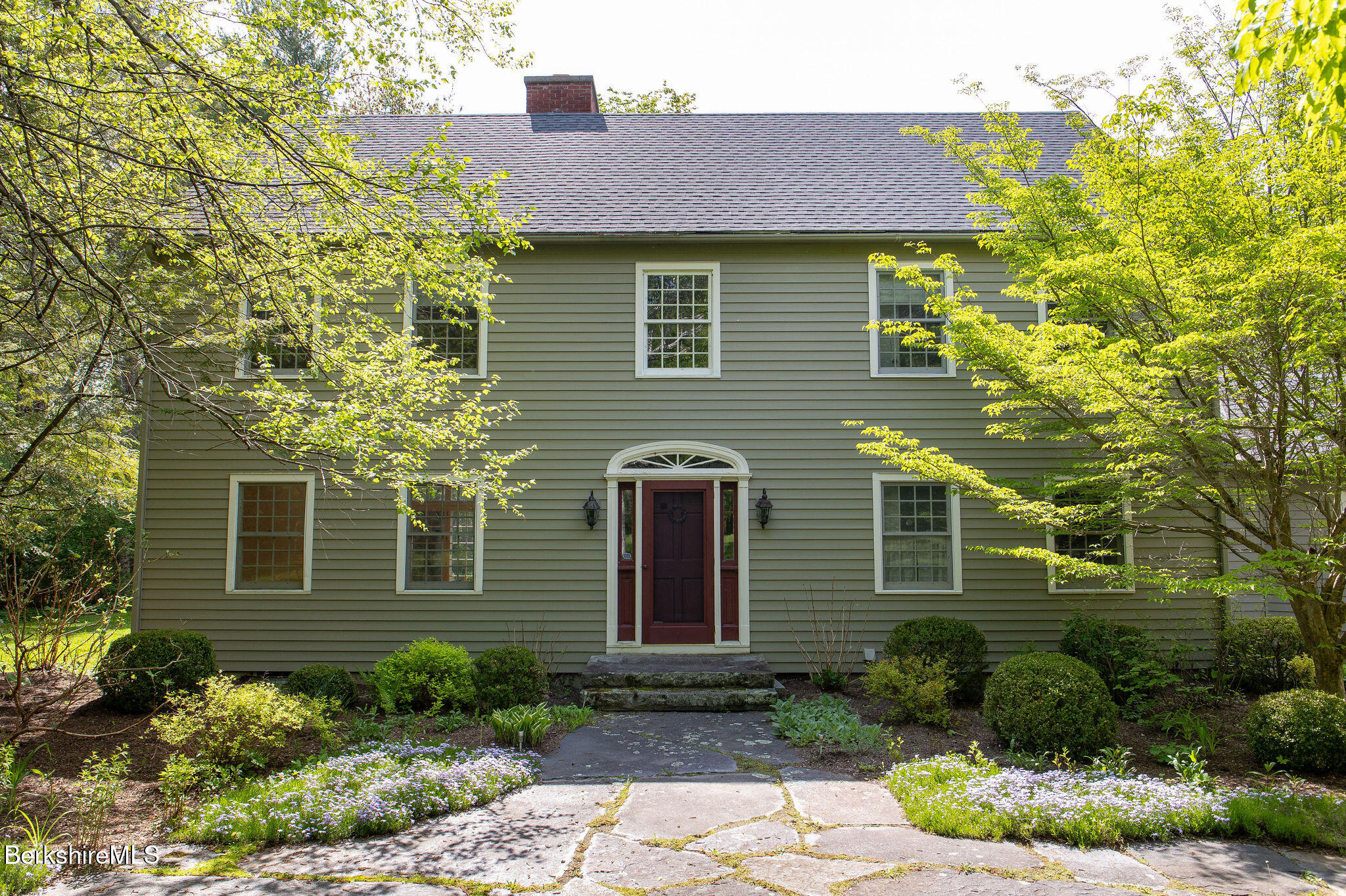 14 Old Tree Farm Road Stockbridge, MA 01266 - Photo 2 of 50 a front view of a house with garden