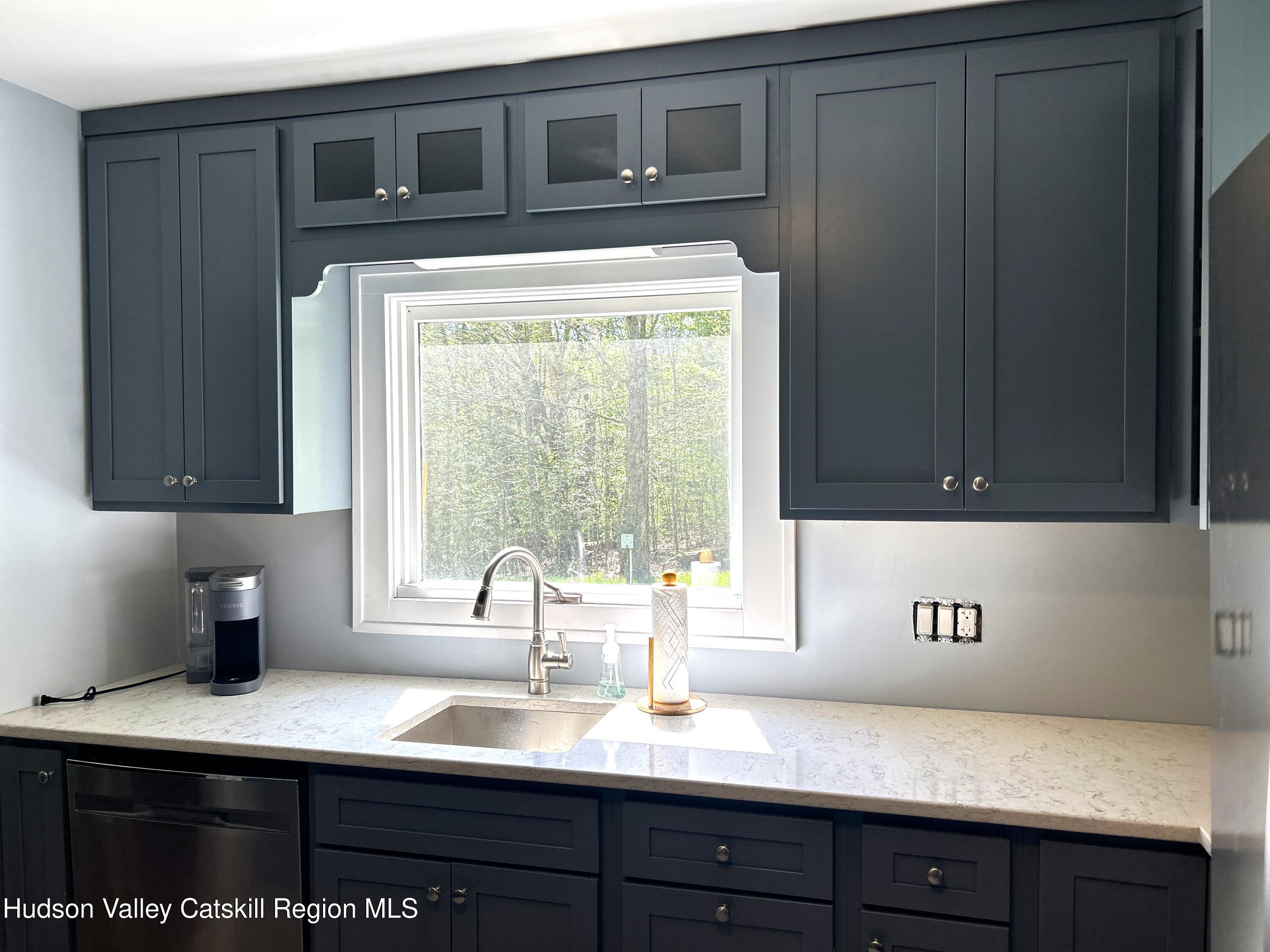 169 Rt 4 Prattsville, NY 12468 - Photo 14 of 35 a kitchen with a sink cabinets and window