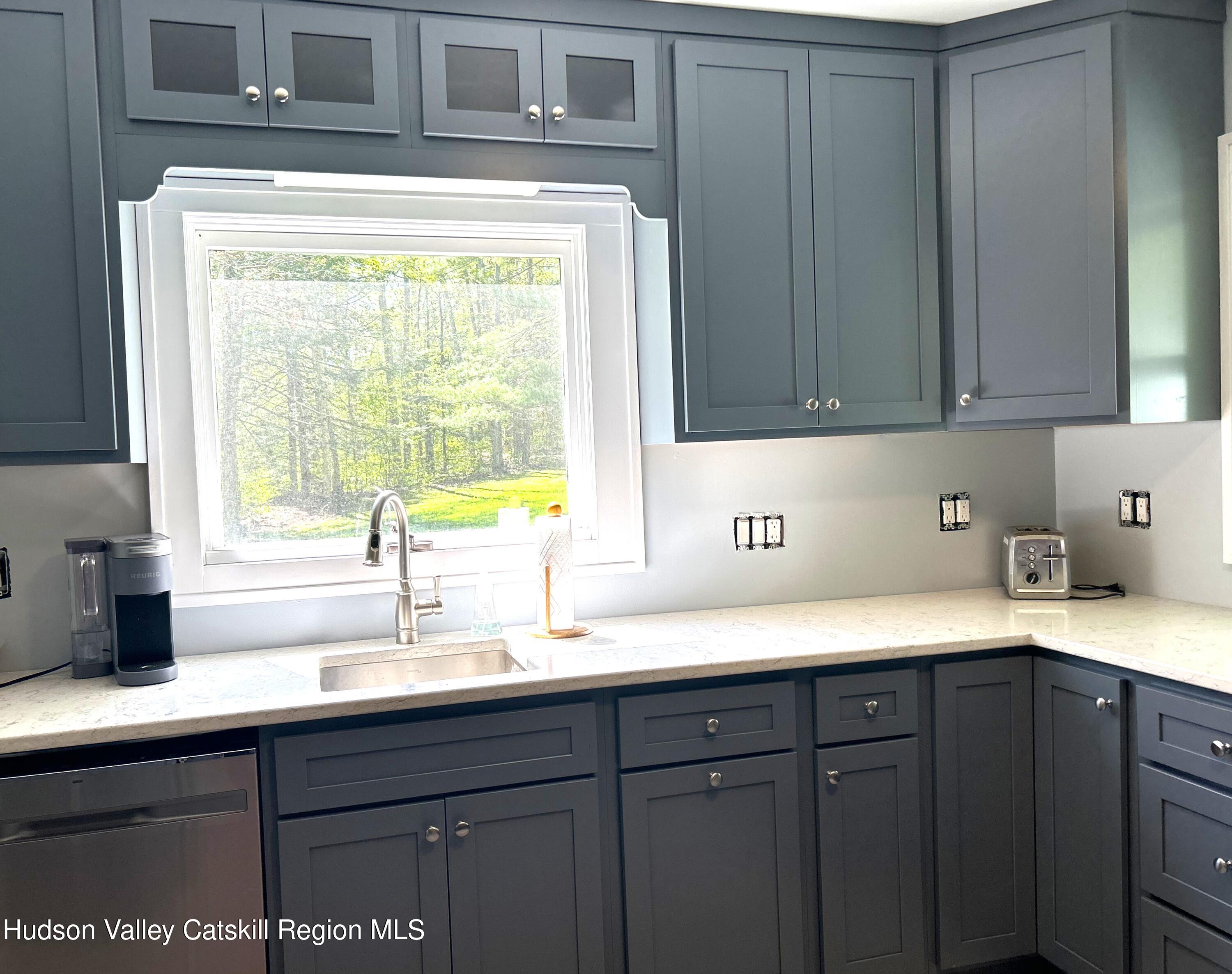169 Rt 4 Prattsville, NY 12468 - Photo 16 of 35 a kitchen with a sink and a window
