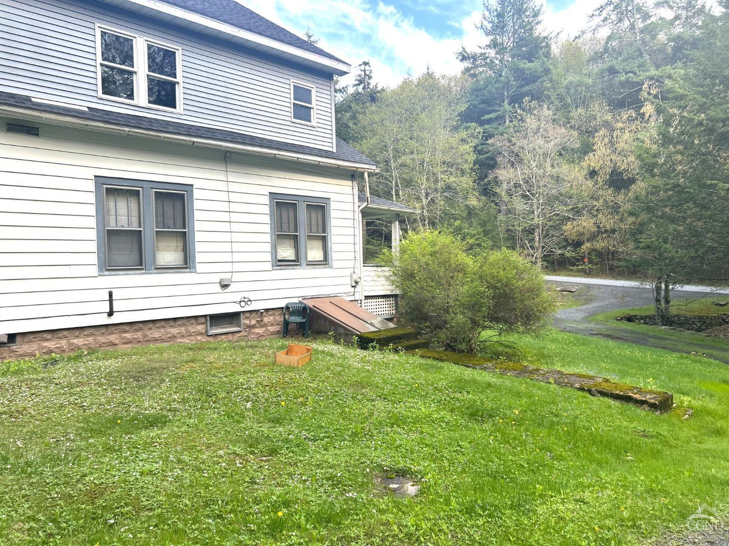 169 Rt 4 Prattsville, NY 12468 - Photo 30 of 35 a view of a house with pool and a yard