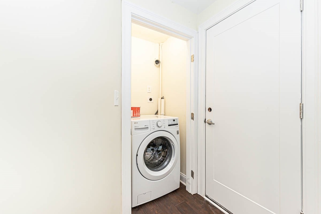 48 Caldwell Road, Unit 48 Waltham, MA 02453 - Photo 16 of 38 a utility room with dryer and washer