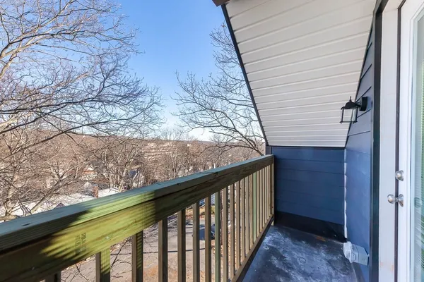 a view of a balcony with an outdoor space