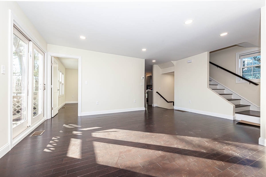 48 Caldwell Road, Unit 48 Waltham, MA 02453 - Photo 7 of 38 a view of an entryway with wooden floor