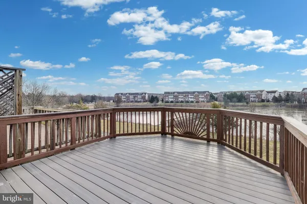 a view of balcony with wooden floor