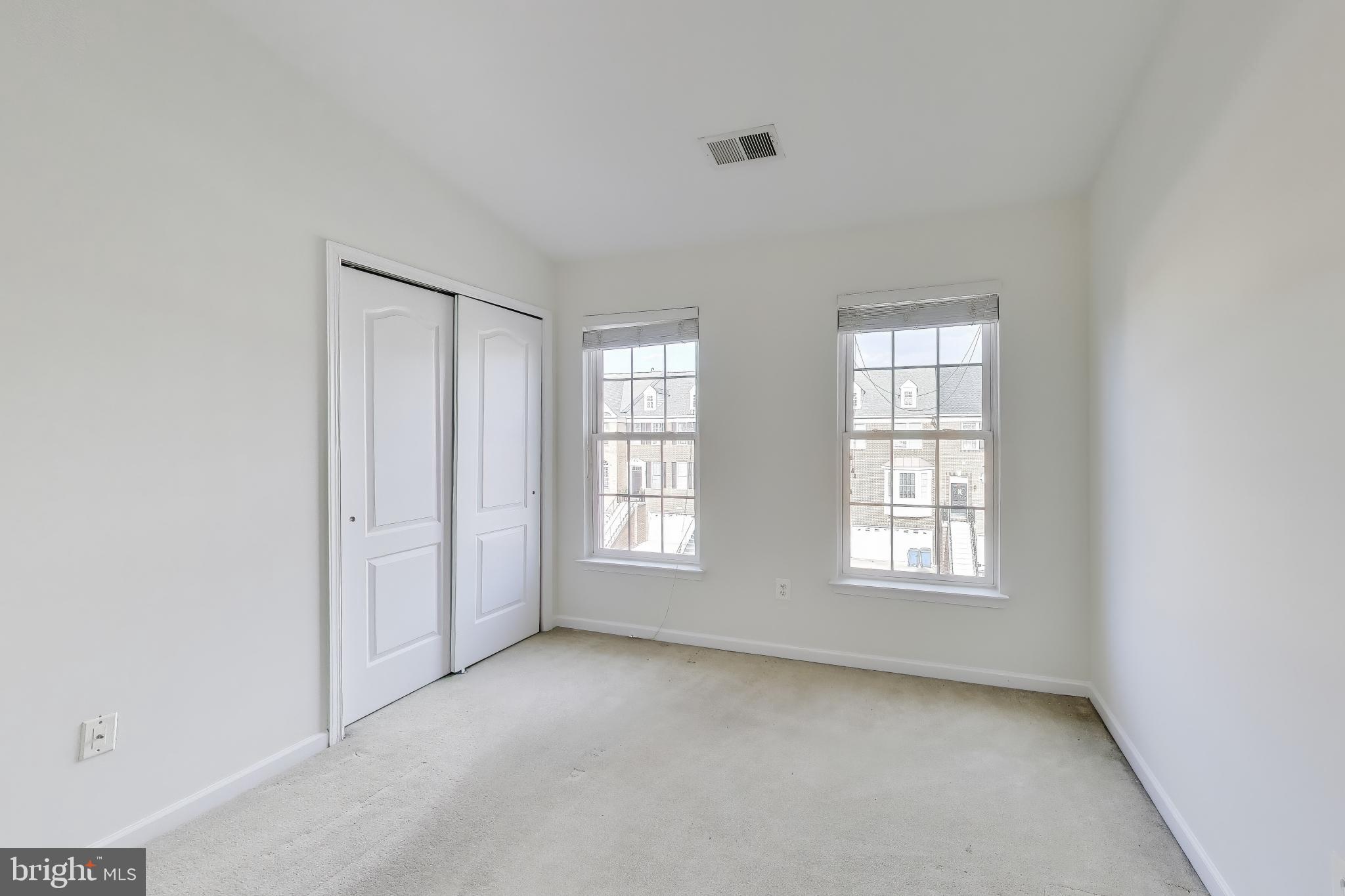 42759 Locklear Terrace Chantilly, VA 20152 - Photo 27 of 38 an empty room with windows