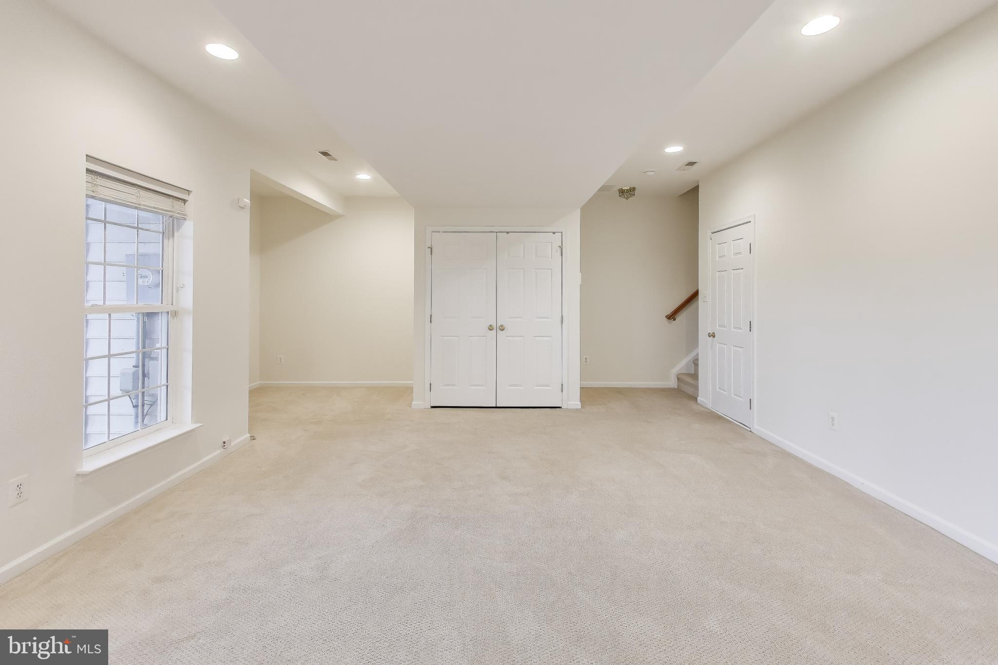 42759 Locklear Terrace Chantilly, VA 20152 - Photo 33 of 38 an empty room with windows and closet