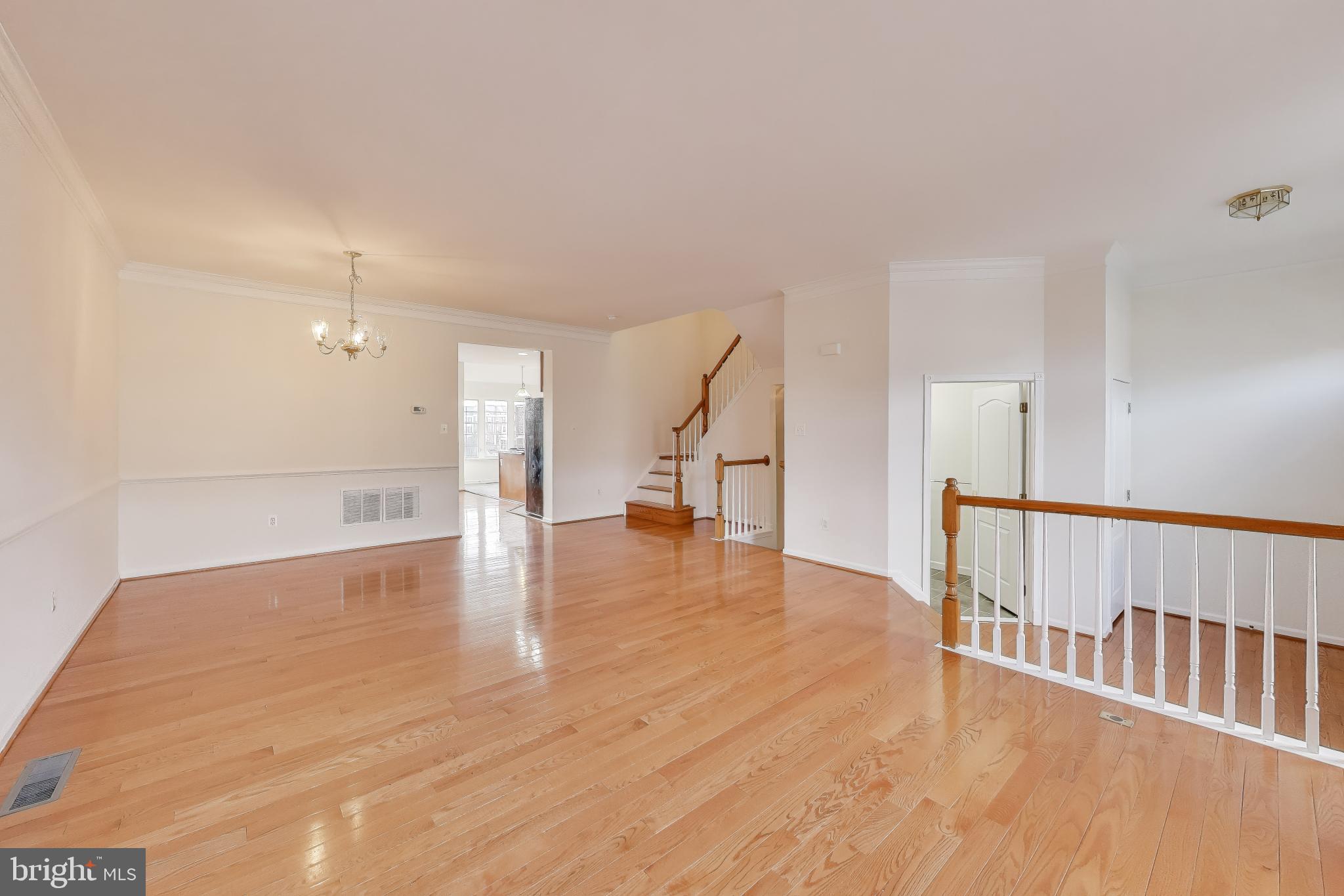 42759 Locklear Terrace Chantilly, VA 20152 - Photo 5 of 38 a view of empty room with wooden floor