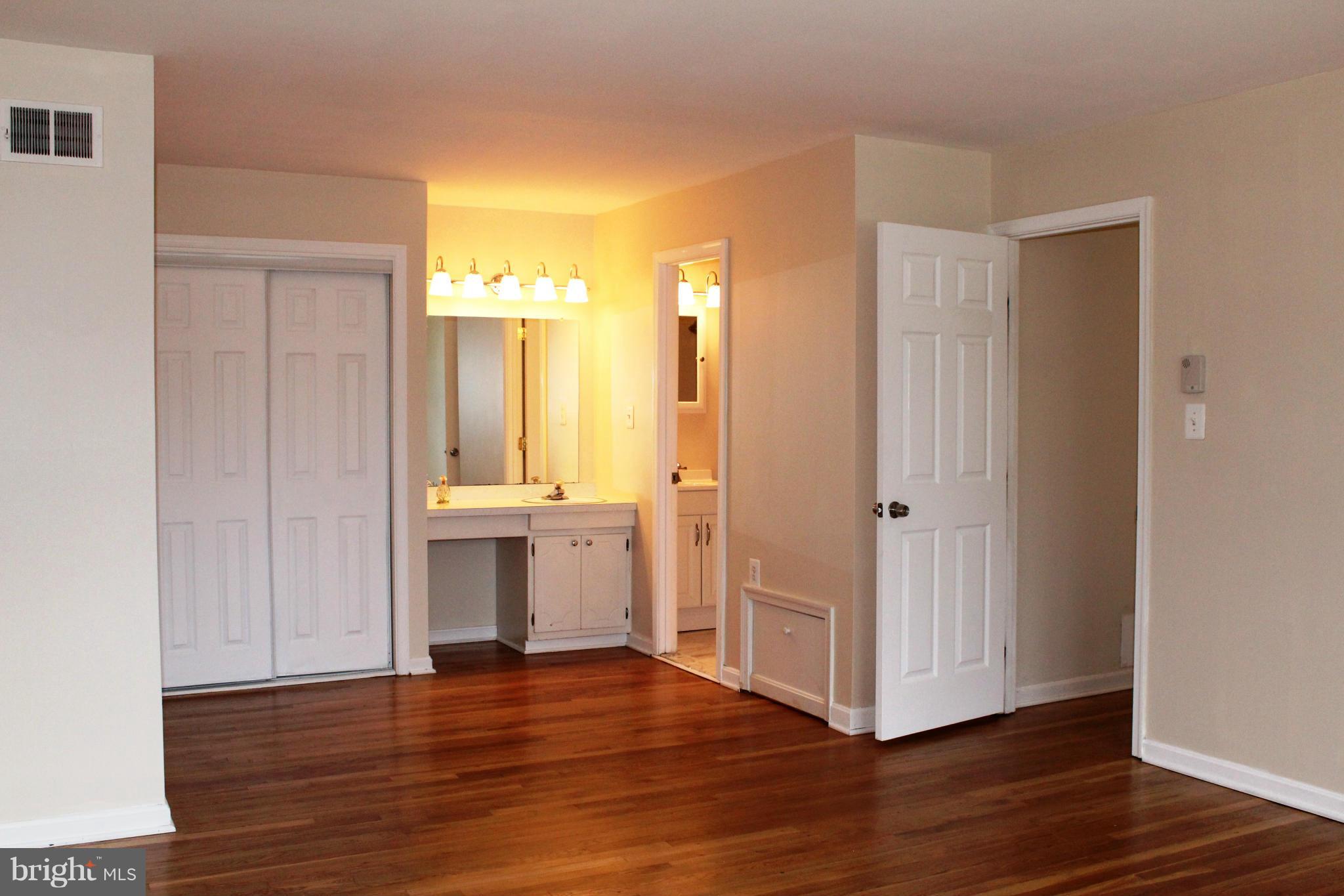 6623 Huntsman Boulevard Springfield, VA 22152 - Photo 13 of 26 Bedroom (Master) with dressing area & 2 closets