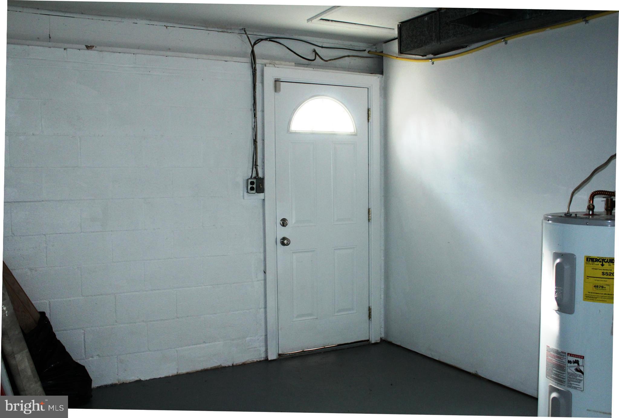 6623 Huntsman Boulevard Springfield, VA 22152 - Photo 25 of 26 Storage/Utility Room with exit to side yard