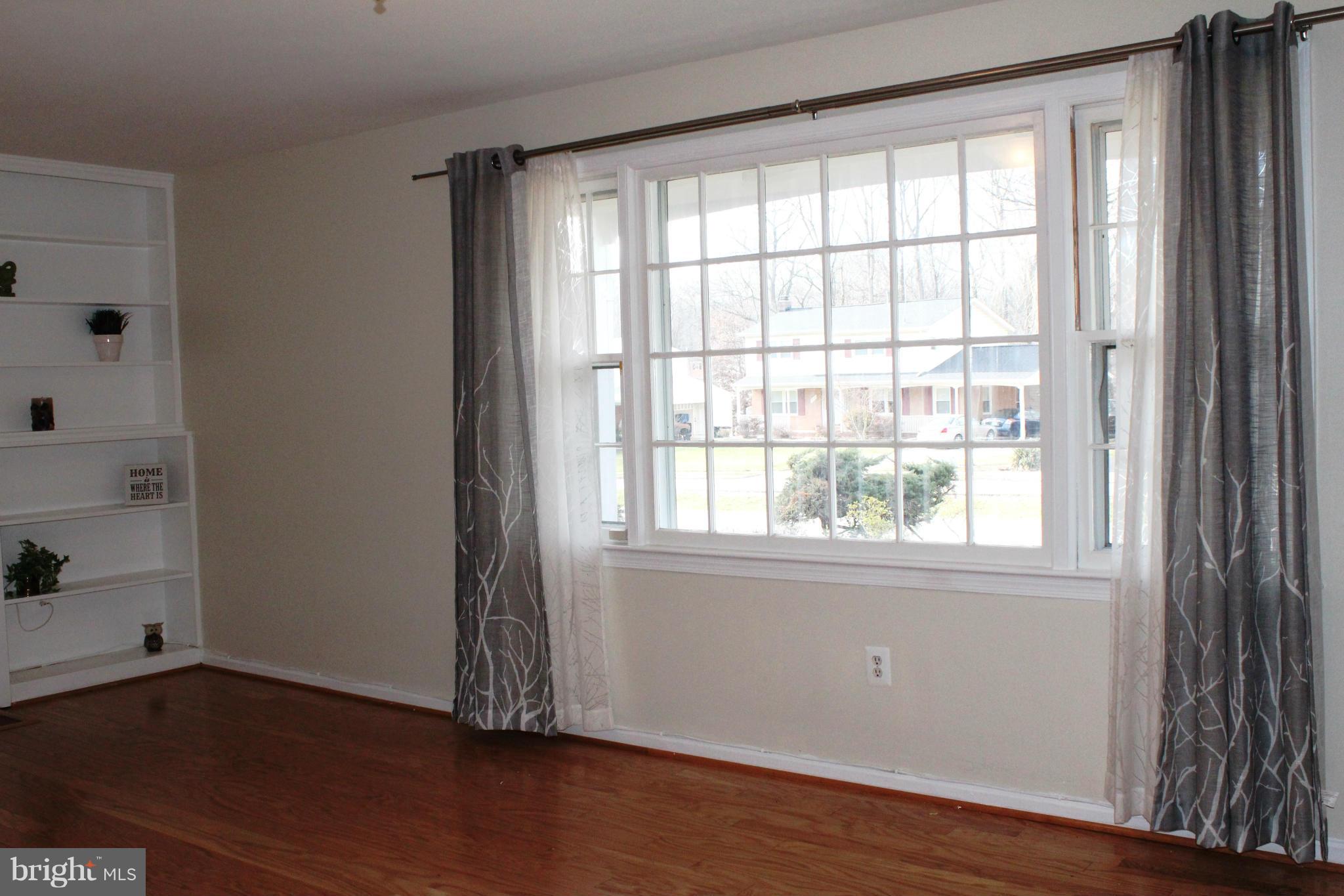 6623 Huntsman Boulevard Springfield, VA 22152 - Photo 5 of 26 Family Room with a big picture window