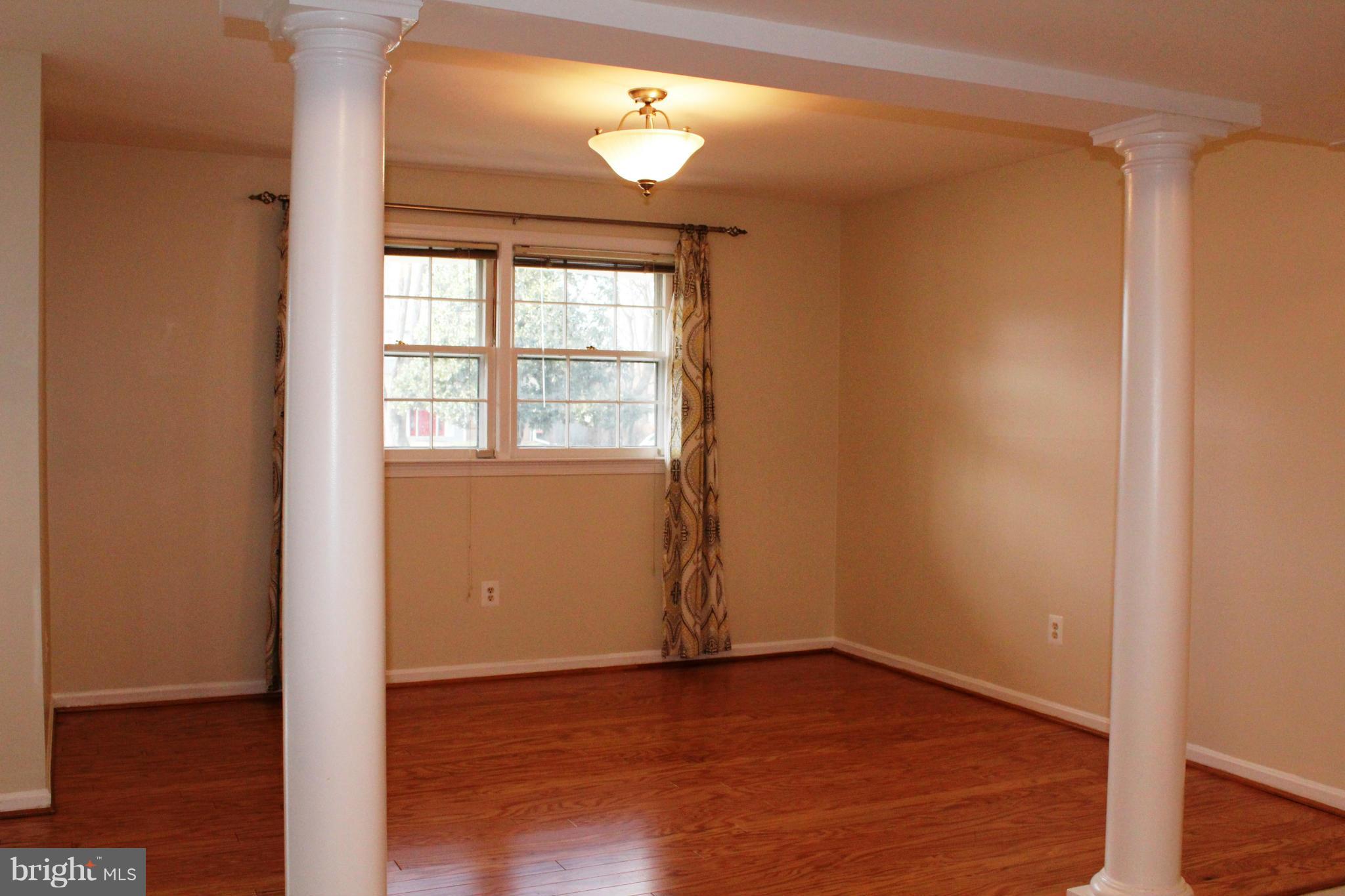 6623 Huntsman Boulevard Springfield, VA 22152 - Photo 9 of 26 Dining Room opens to kitchen