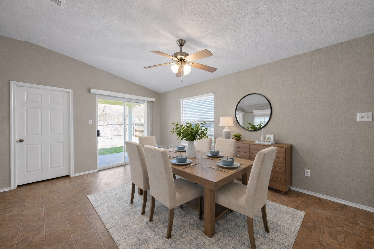 1007 Gentry Drive Leander, TX 78641 - Photo 17 of 35 a view of a dining room with furniture a rug and wooden floor