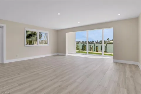 a view of livingroom with hardwood floor and window