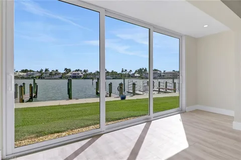 a view of a living room and a terrace