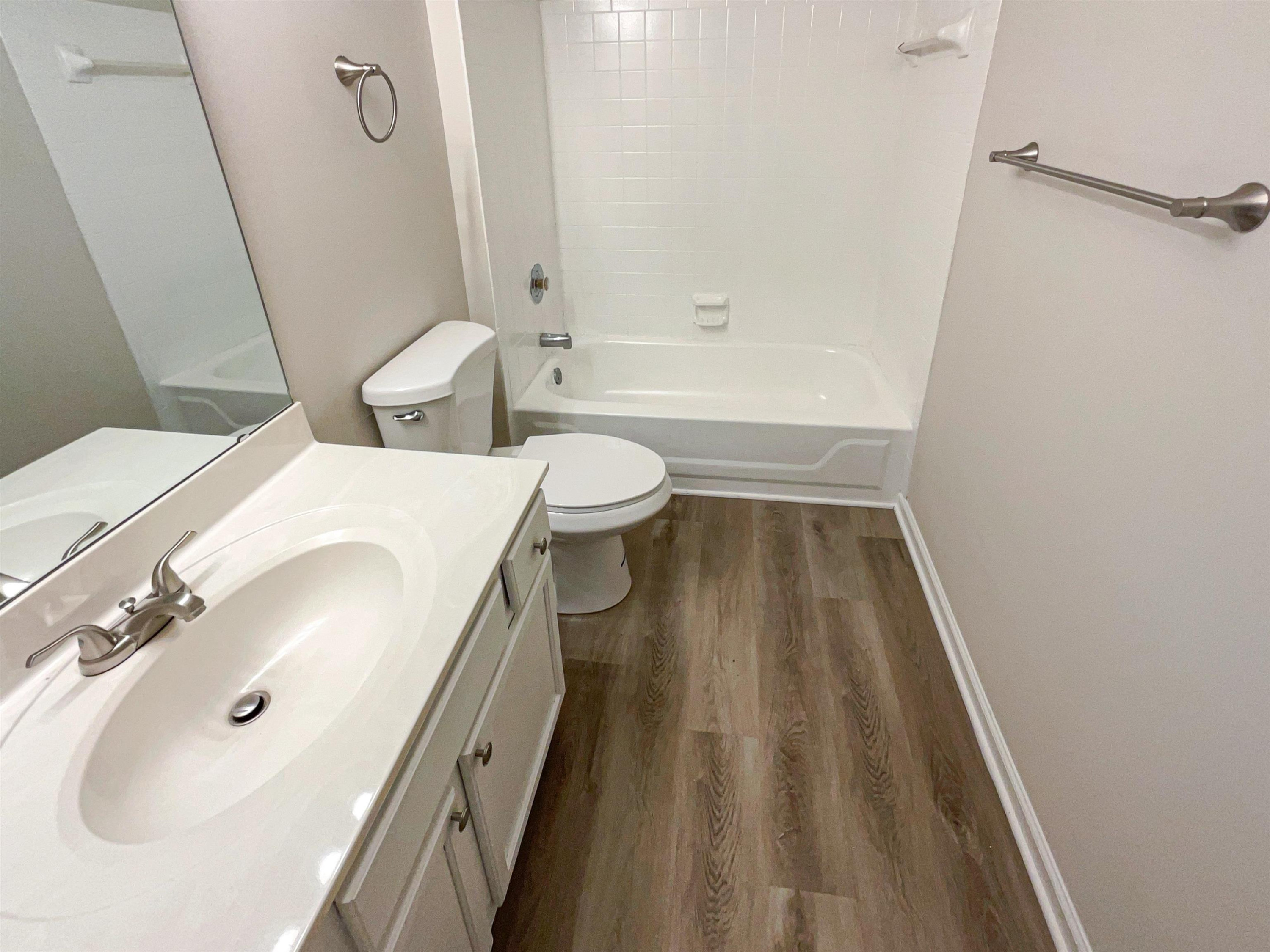 7416 Wisconsin Court Raleigh, NC 27615 - Photo 11 of 17 a bathroom with a sink and a mirror