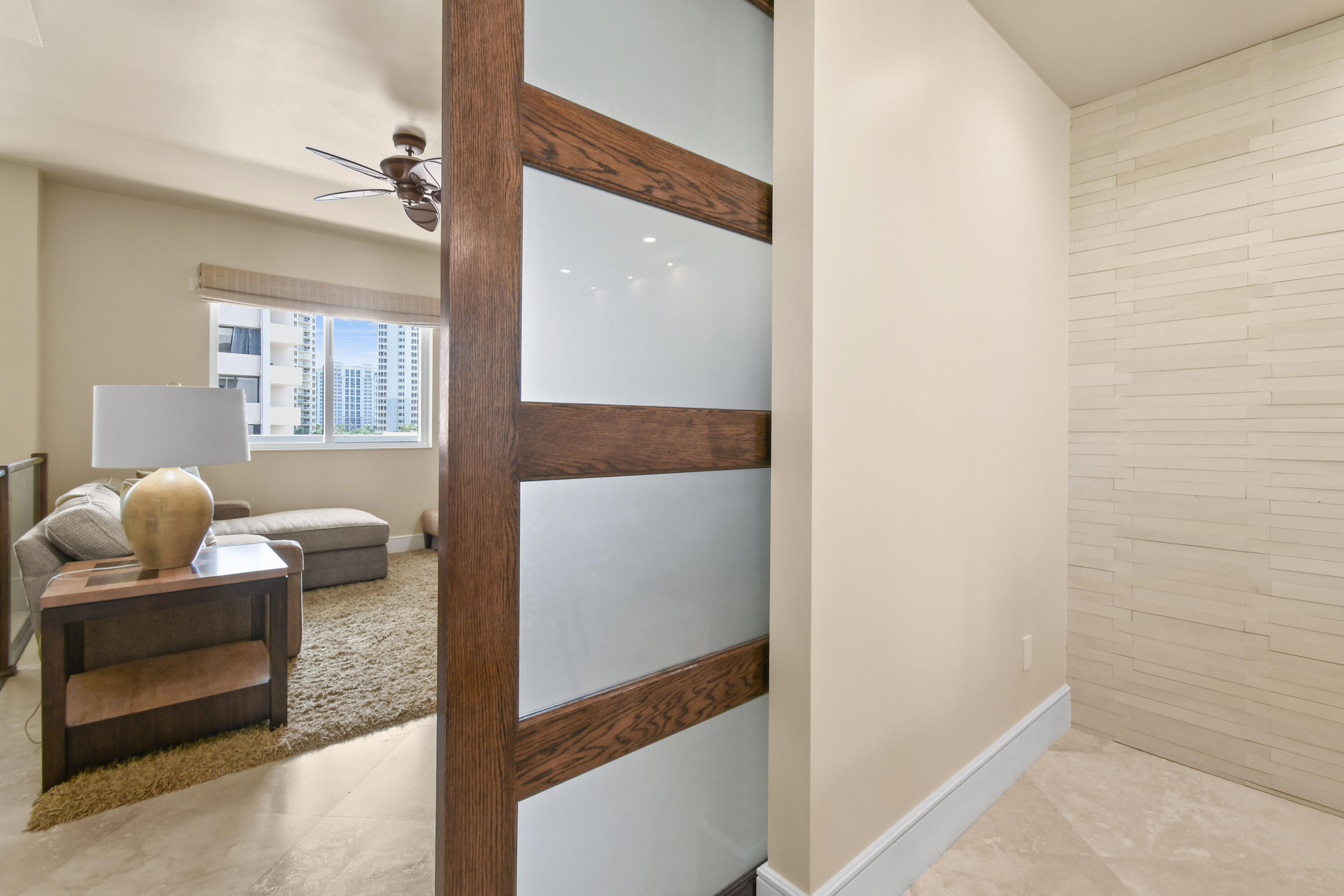 4600 North Ocean Drive, Unit 406 Singer Island, FL 33404 - Photo 11 of 106 a living room with furniture and a window