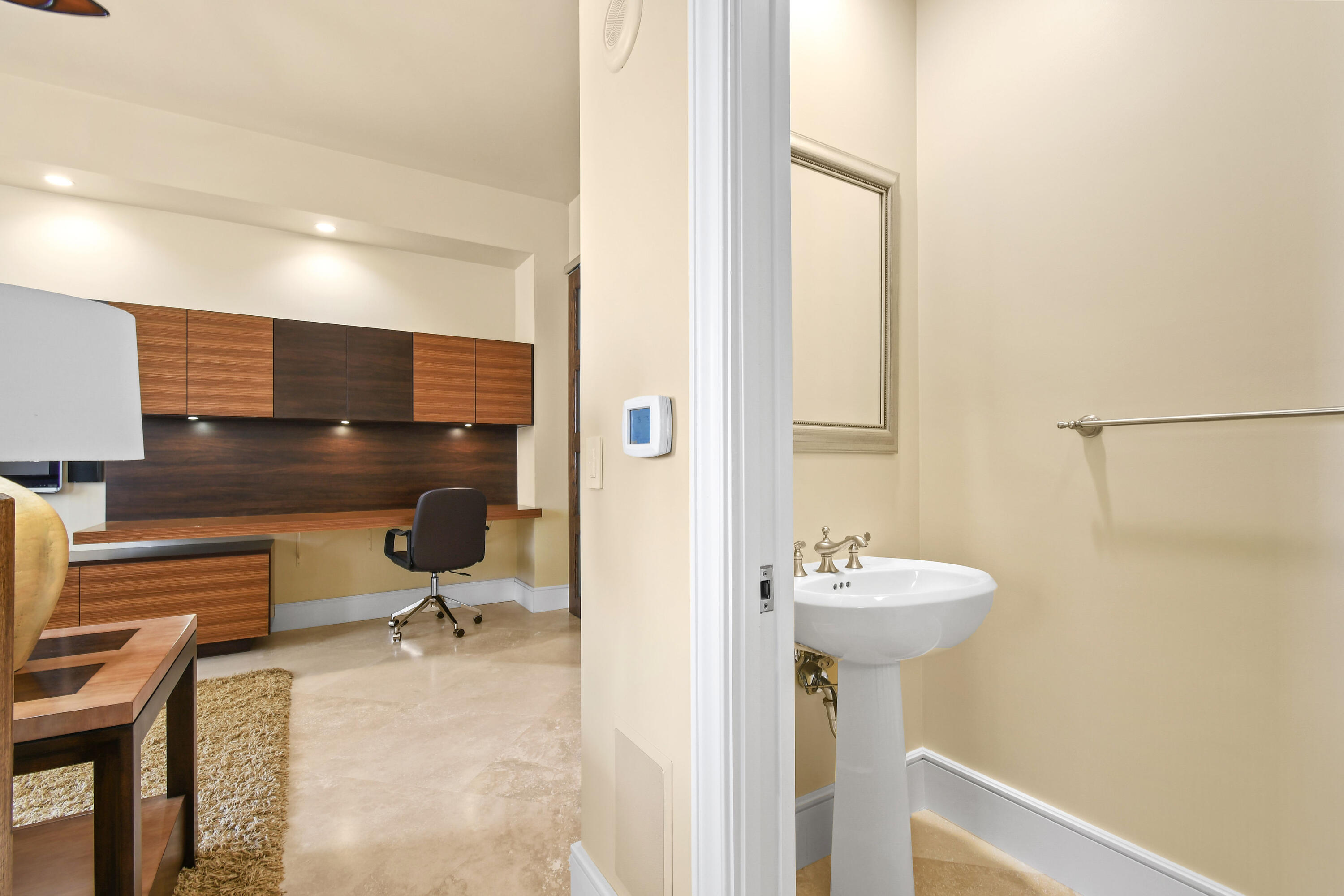 4600 North Ocean Drive, Unit 406 Singer Island, FL 33404 - Photo 15 of 106 a bathroom with a sink a mirror and a shower