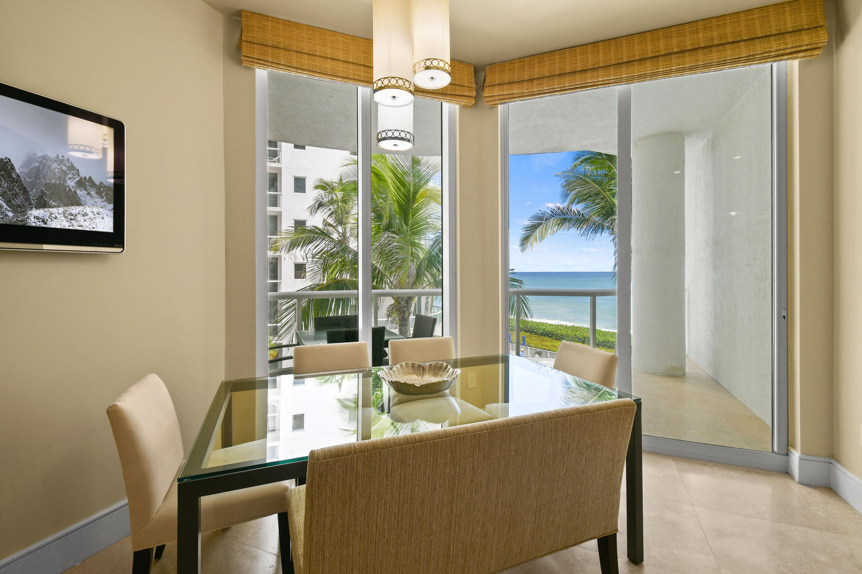 4600 North Ocean Drive, Unit 406 Singer Island, FL 33404 - Photo 22 of 106 a dining room with furniture and a window