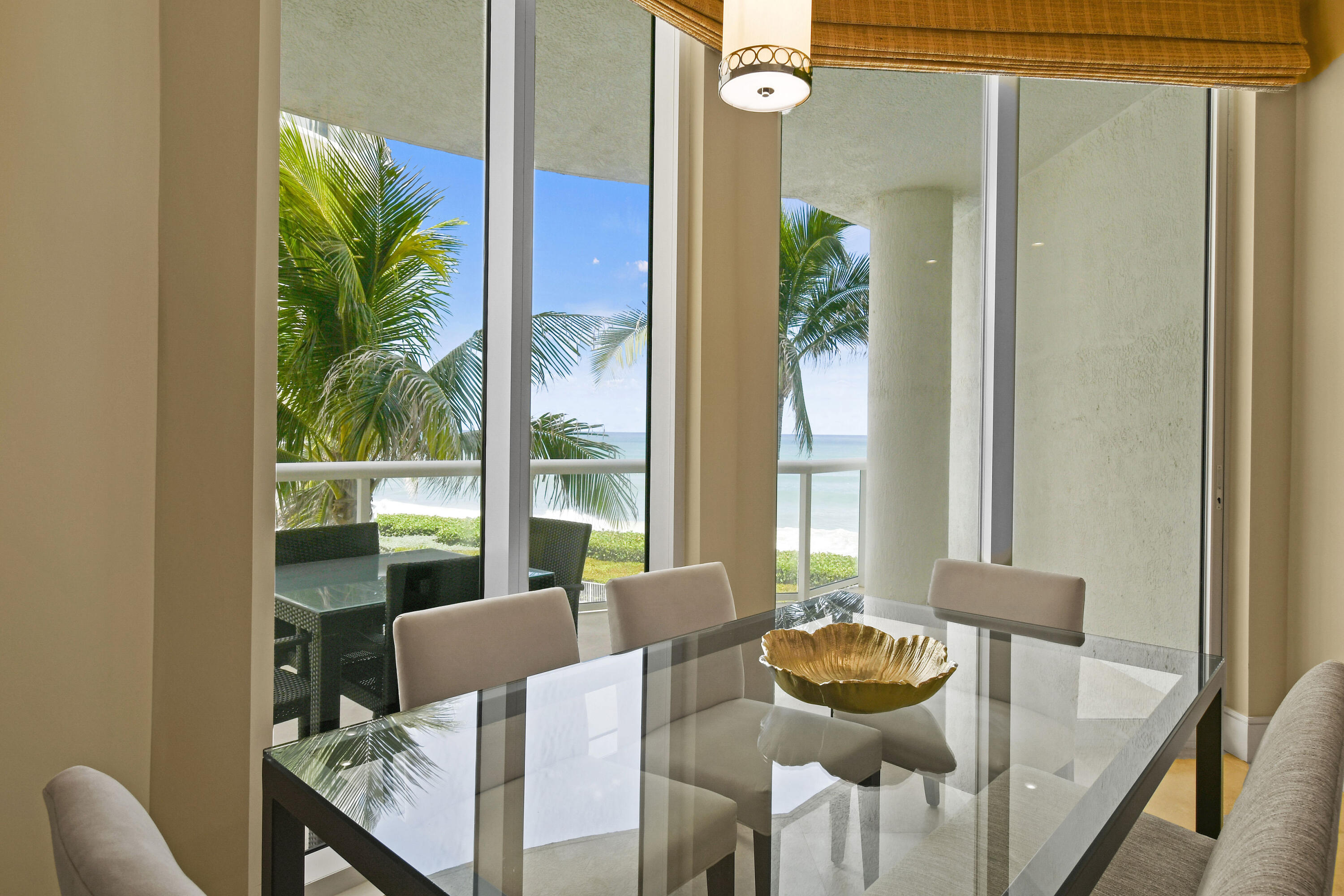 4600 North Ocean Drive, Unit 406 Singer Island, FL 33404 - Photo 23 of 106 a view of a dining room with furniture window and outside view