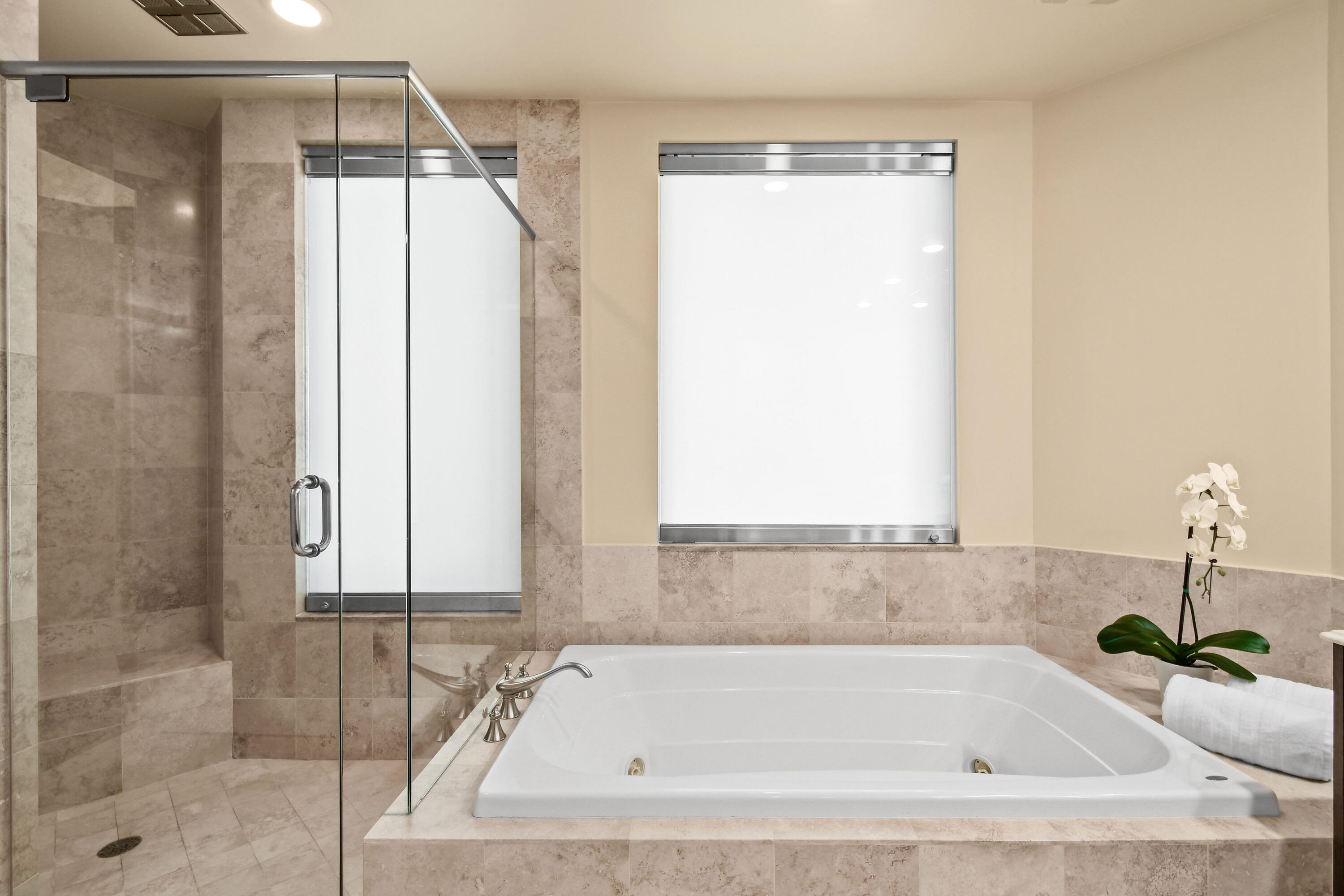 4600 North Ocean Drive, Unit 406 Singer Island, FL 33404 - Photo 50 of 106 a bathroom with a tub and shower