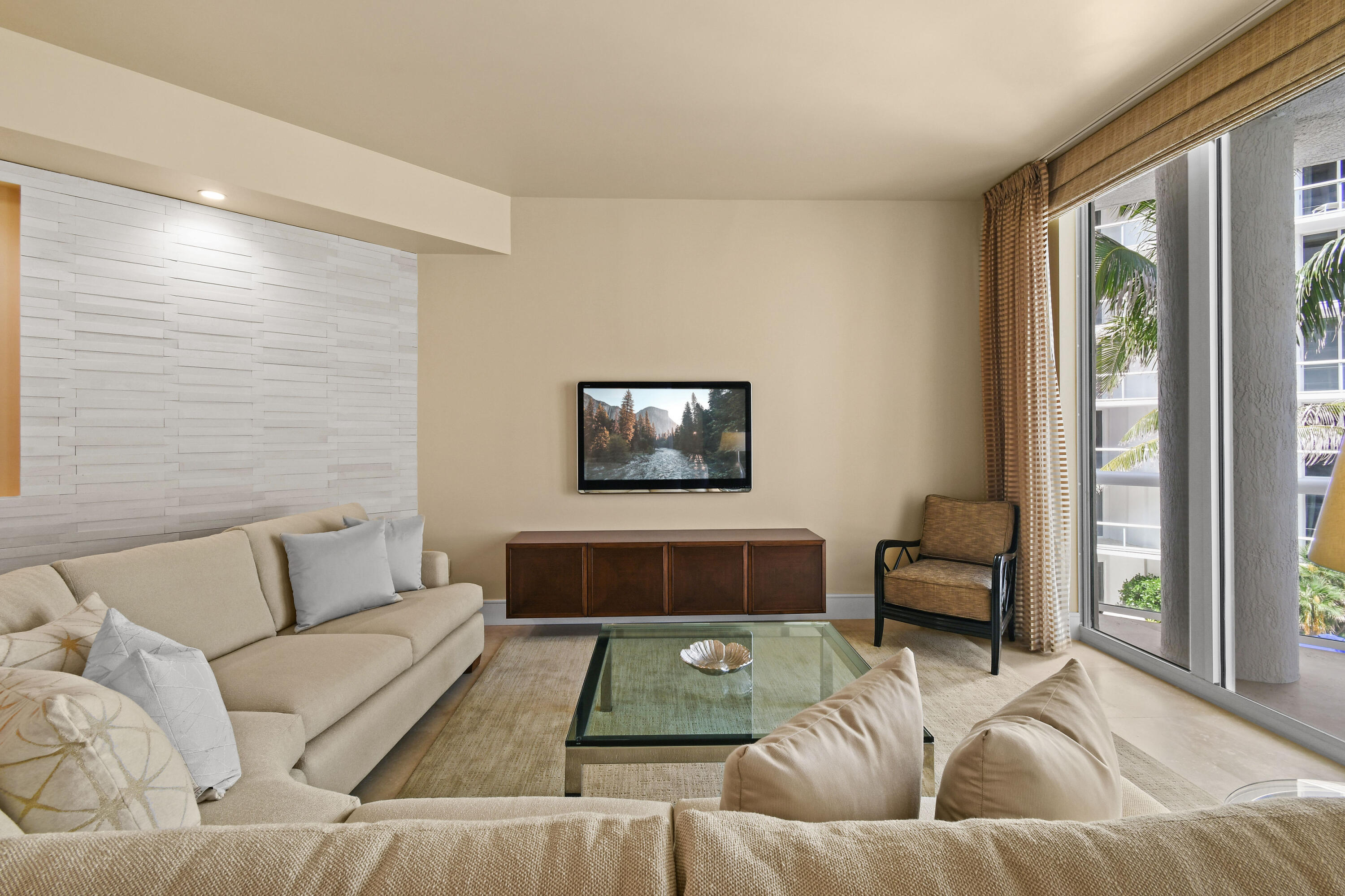 4600 North Ocean Drive, Unit 406 Singer Island, FL 33404 - Photo 6 of 106 a living room with furniture and a window