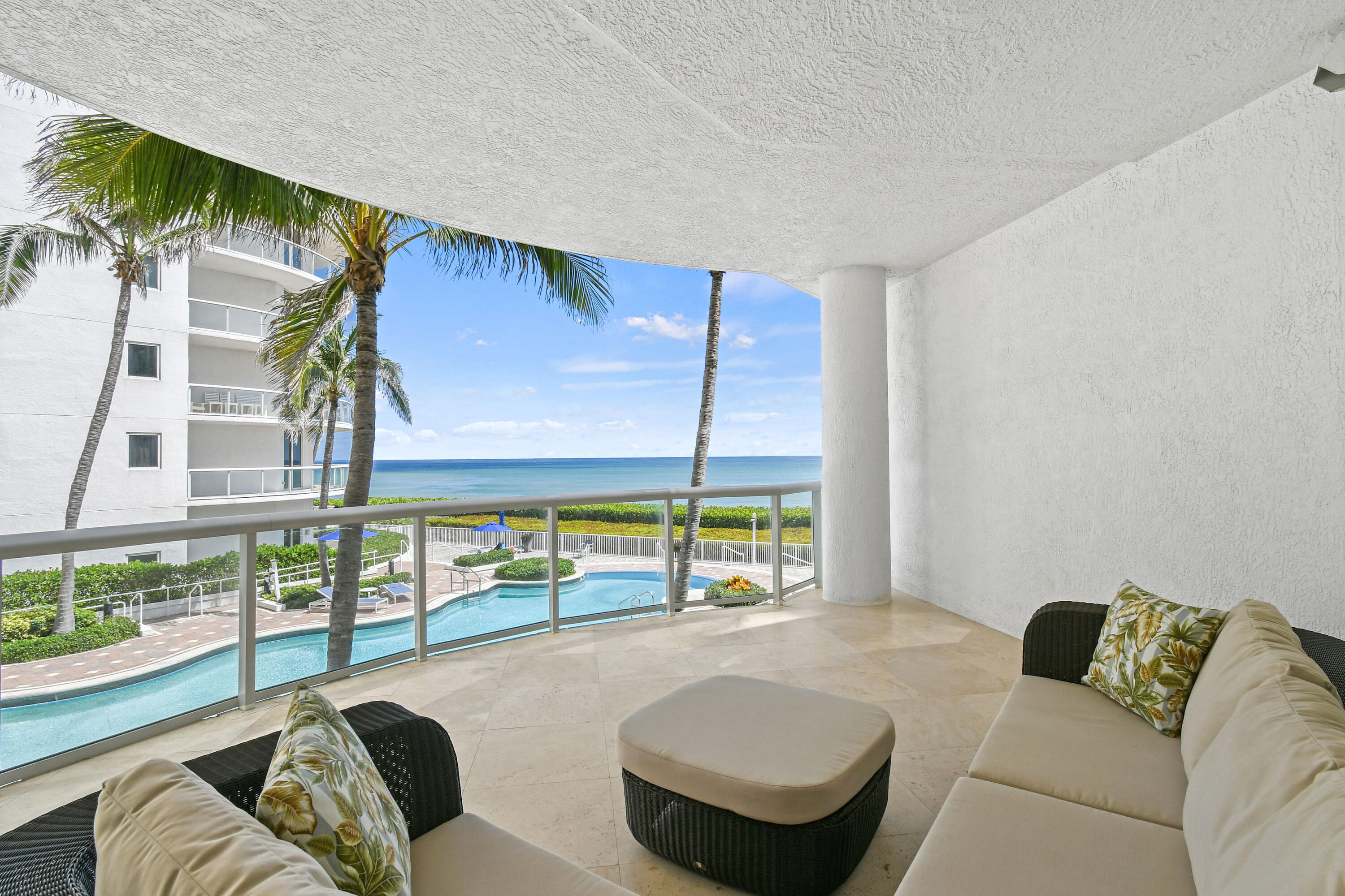 4600 North Ocean Drive, Unit 406 Singer Island, FL 33404 - Photo 69 of 106 a living room with furniture and a floor to ceiling window