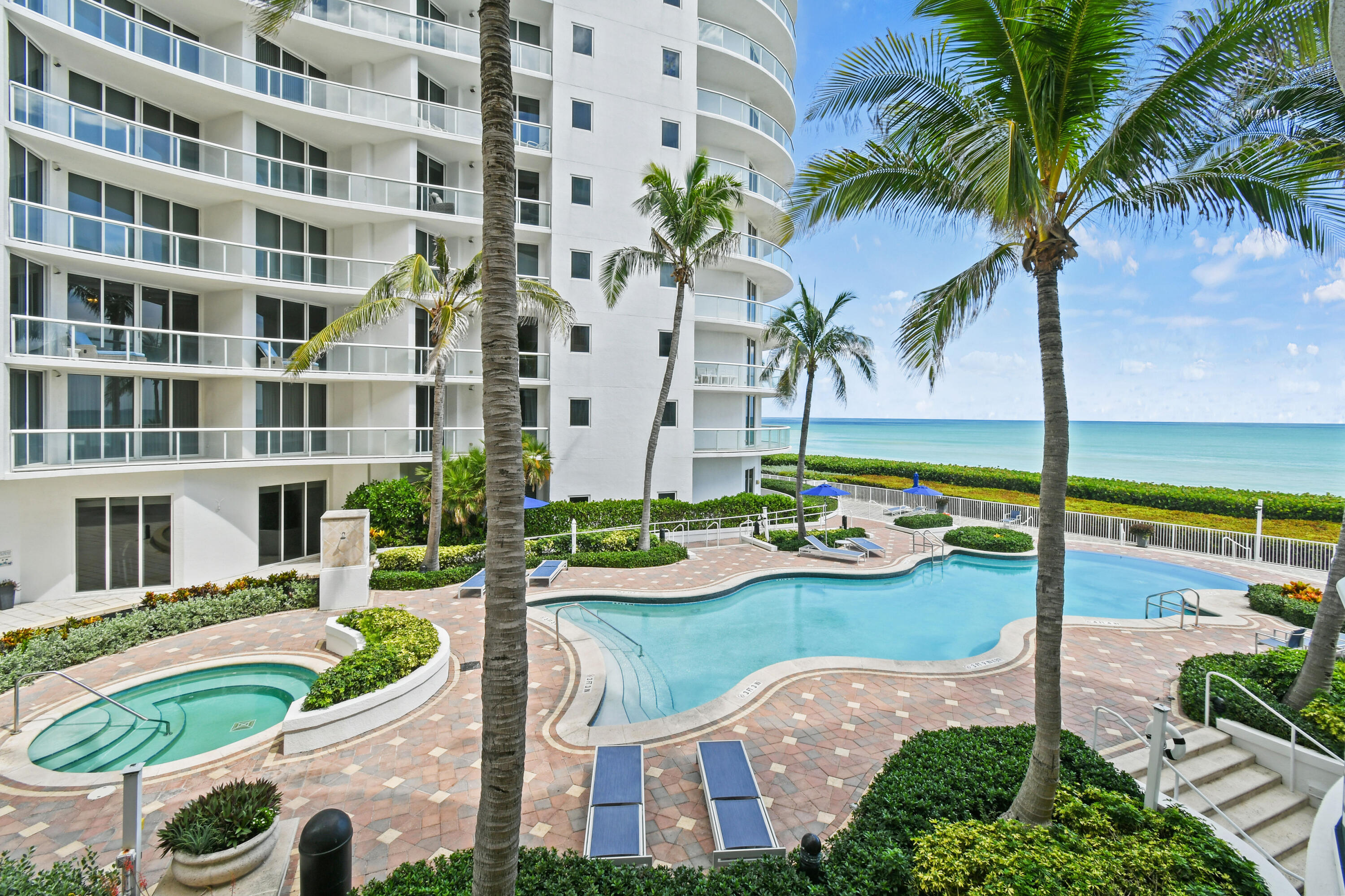 4600 North Ocean Drive, Unit 406 Singer Island, FL 33404 - Photo 70 of 106 a view of a patio with plants and table and chairs potted plants