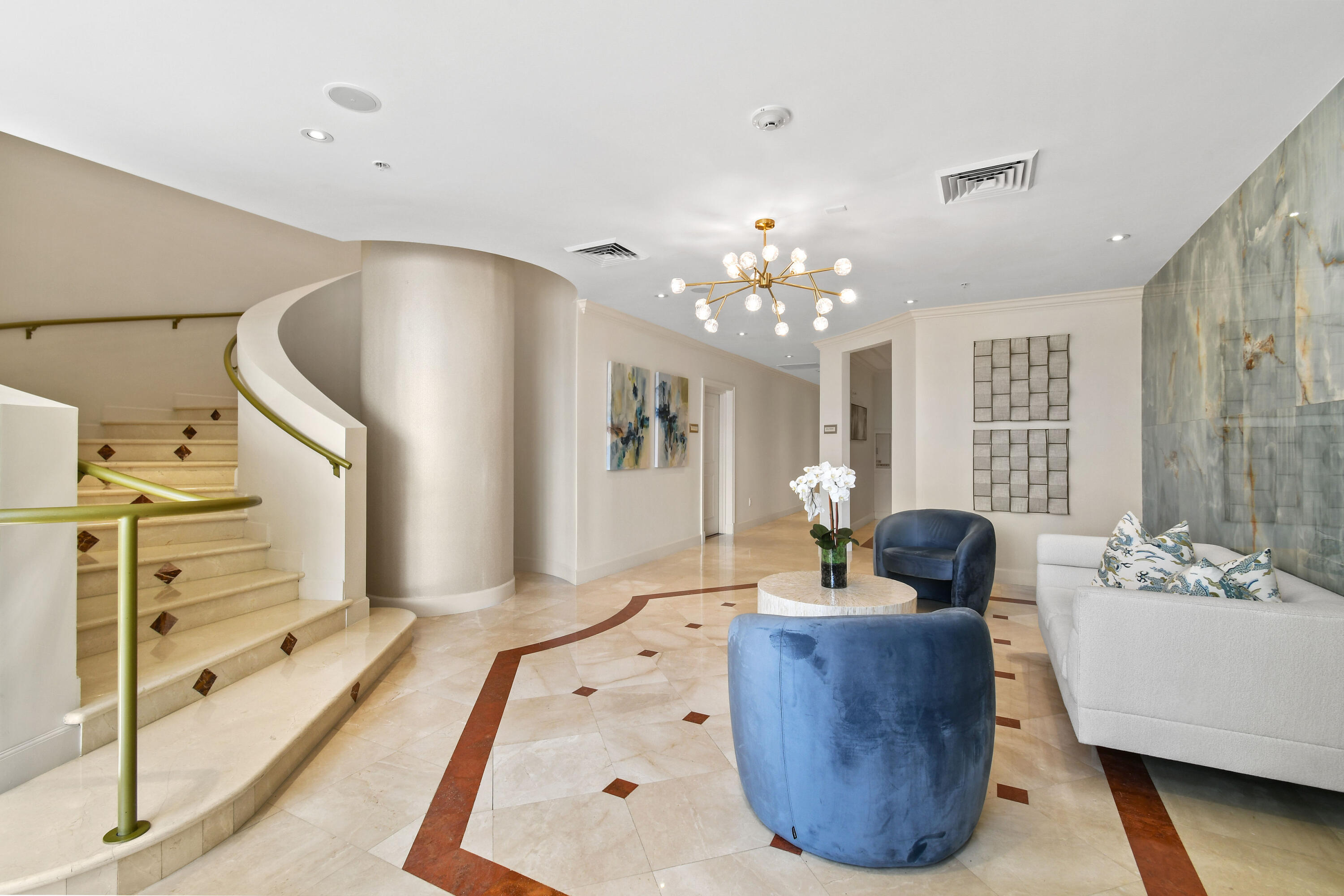 4600 North Ocean Drive, Unit 406 Singer Island, FL 33404 - Photo 84 of 106 a living room with furniture and a chandelier