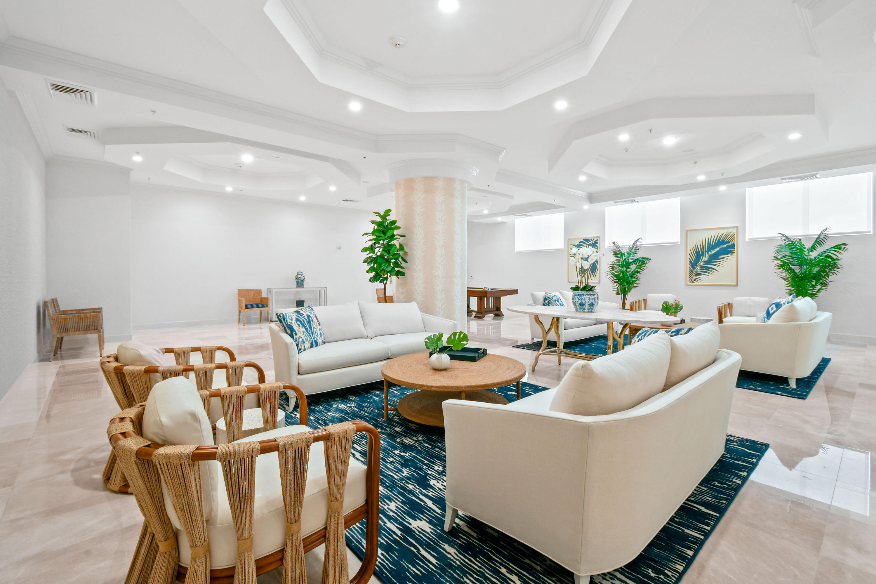 4600 North Ocean Drive, Unit 406 Singer Island, FL 33404 - Photo 89 of 106 a living room with furniture and a chandelier