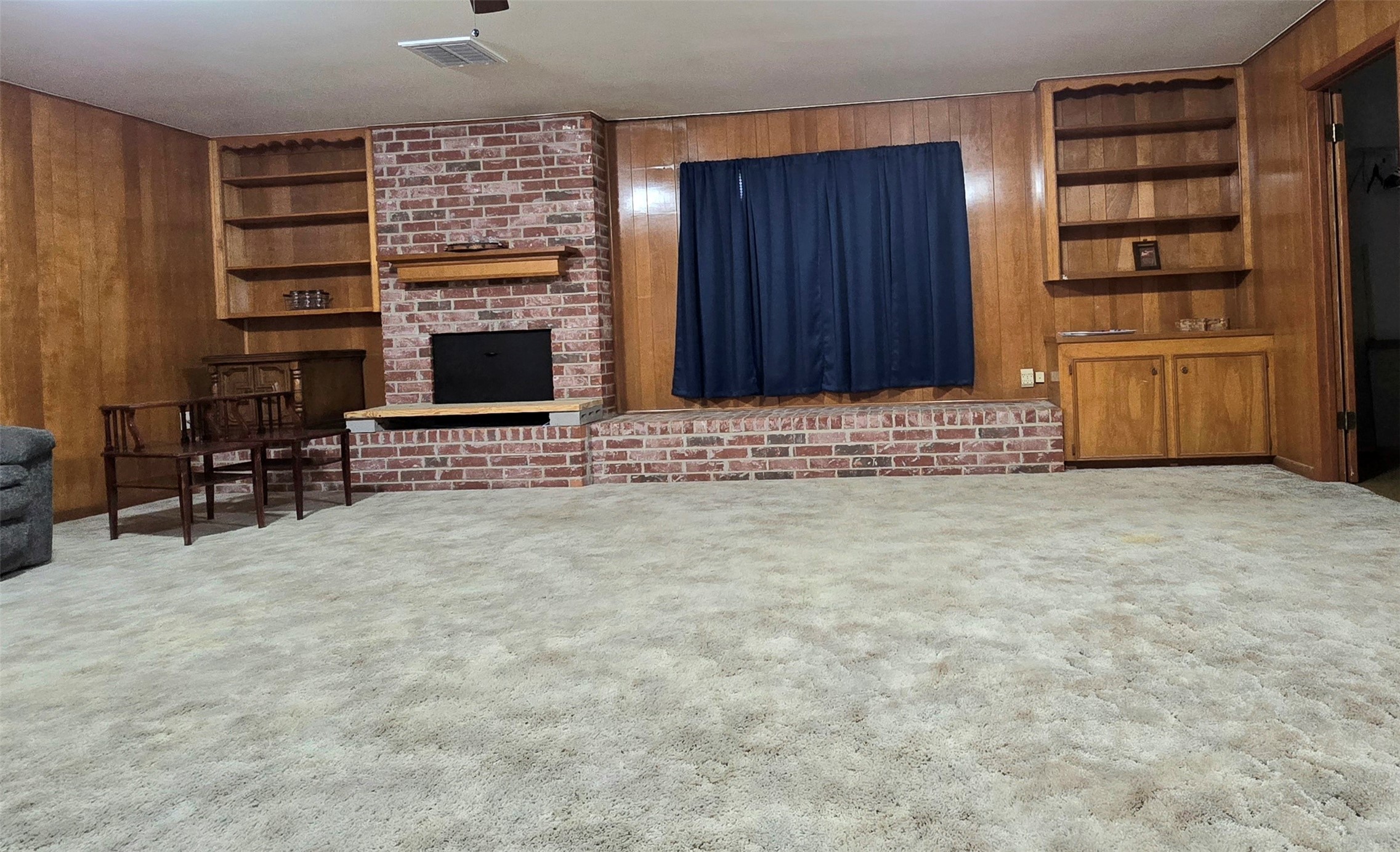 607 South Main Street Dayton, TX 77535 - Photo 14 of 39 a view of an empty room with furniture and staircase