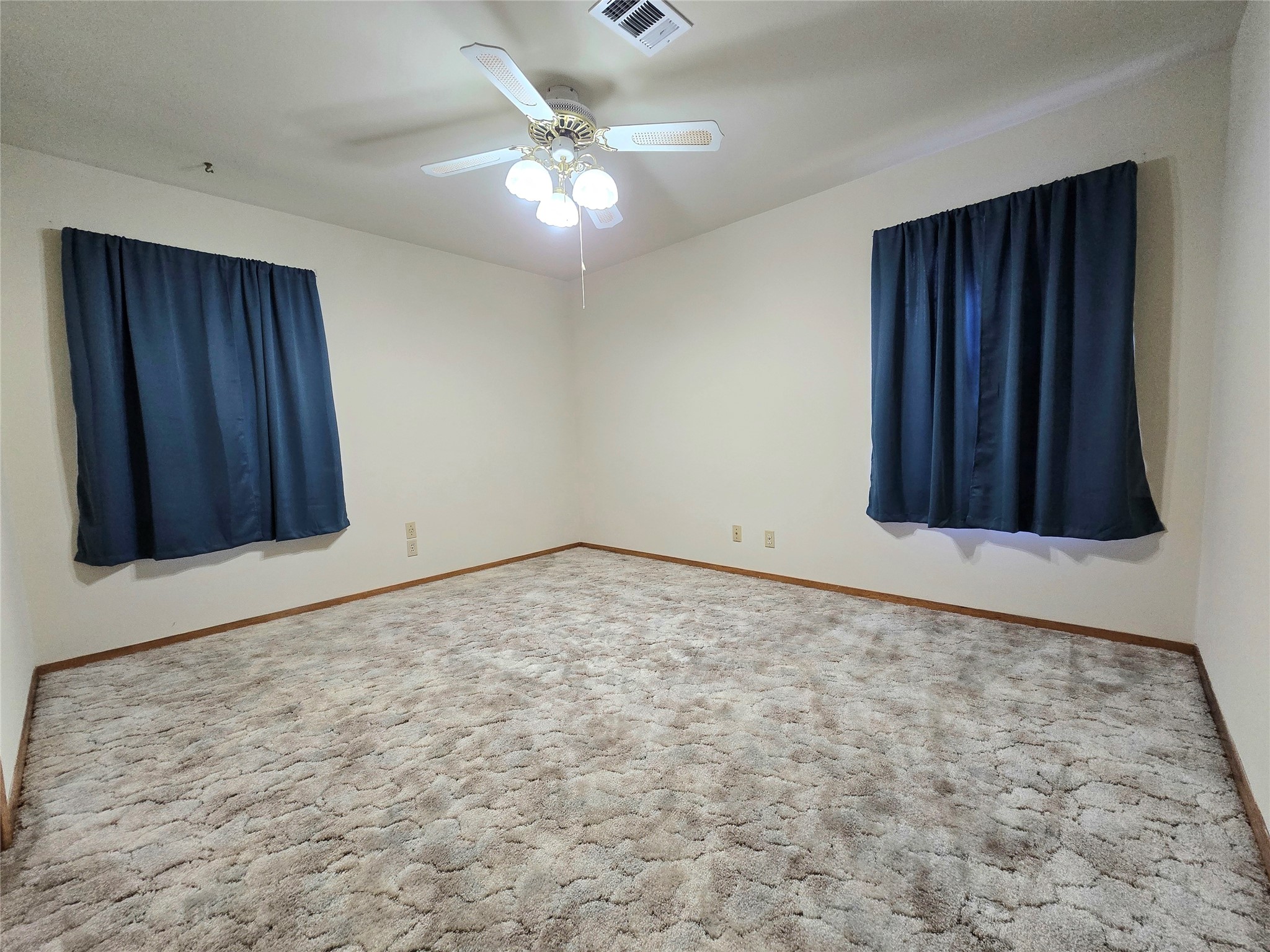 607 South Main Street Dayton, TX 77535 - Photo 19 of 39 a view of an empty room with a window