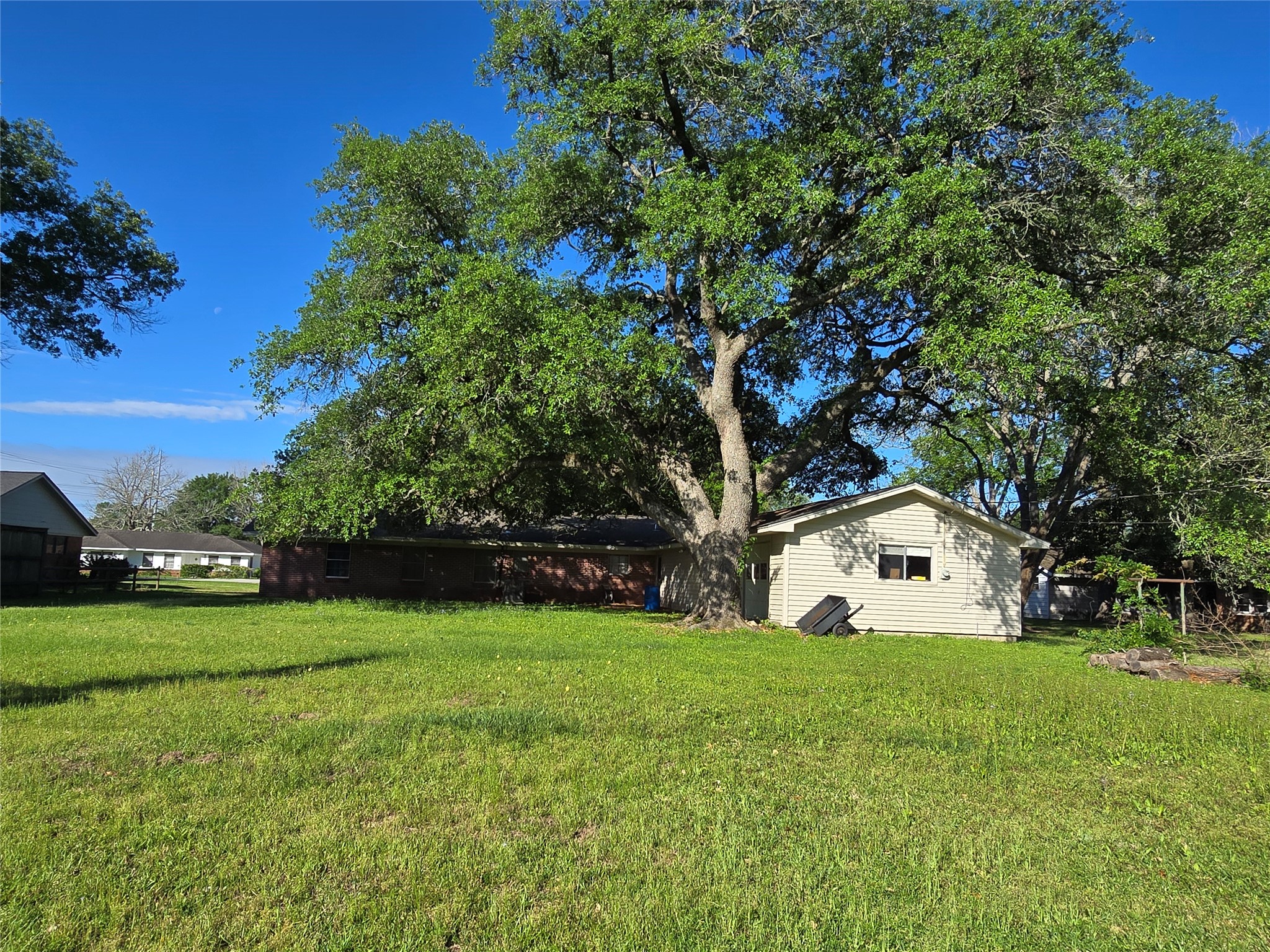 607 South Main Street Dayton, TX 77535 - Photo 35 of 39 a view of white house with a yard