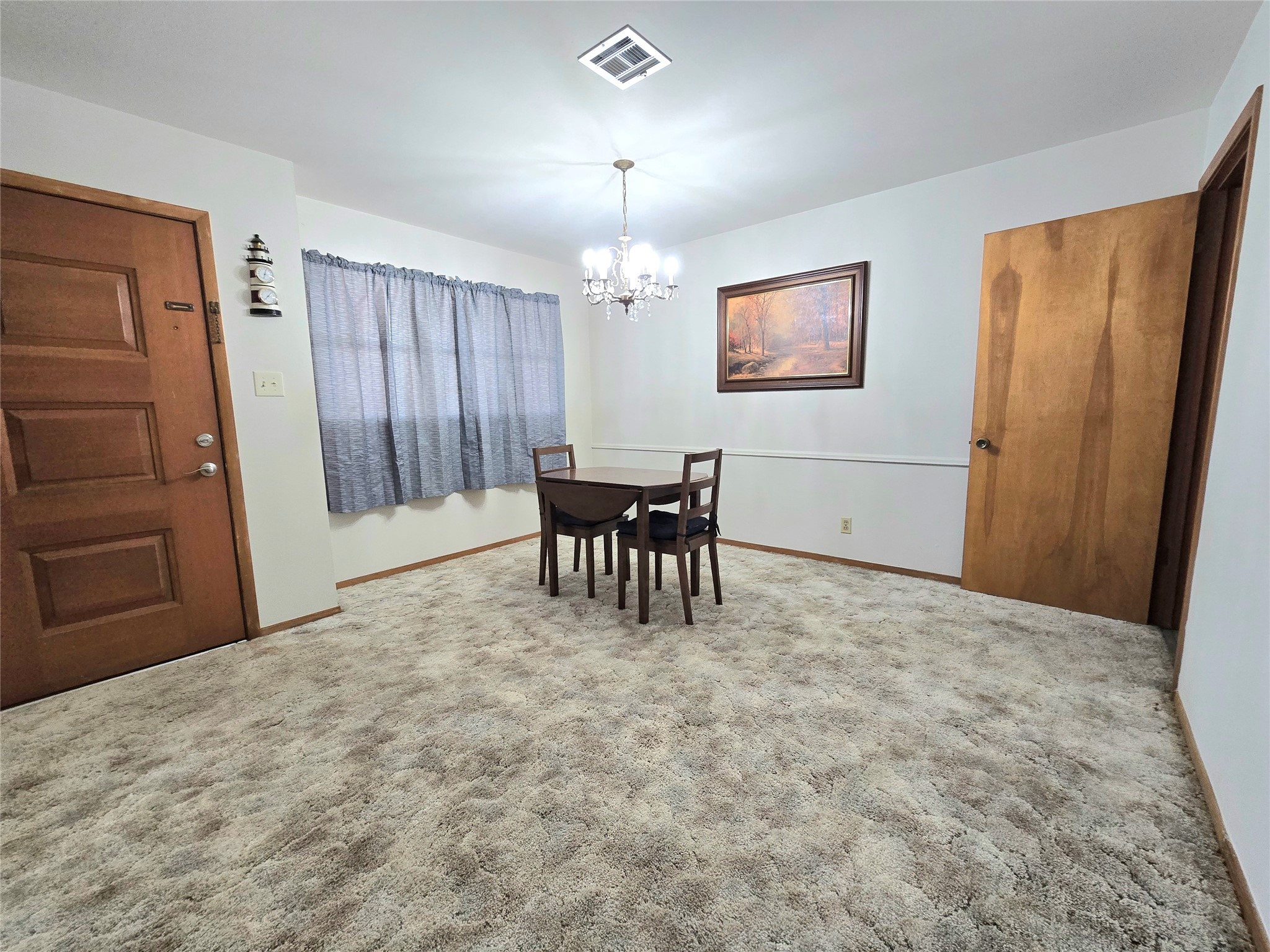 607 South Main Street Dayton, TX 77535 - Photo 8 of 39 a view of a livingroom with furniture and window
