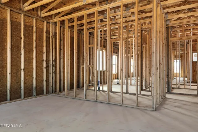 a view of a room with wooden walls