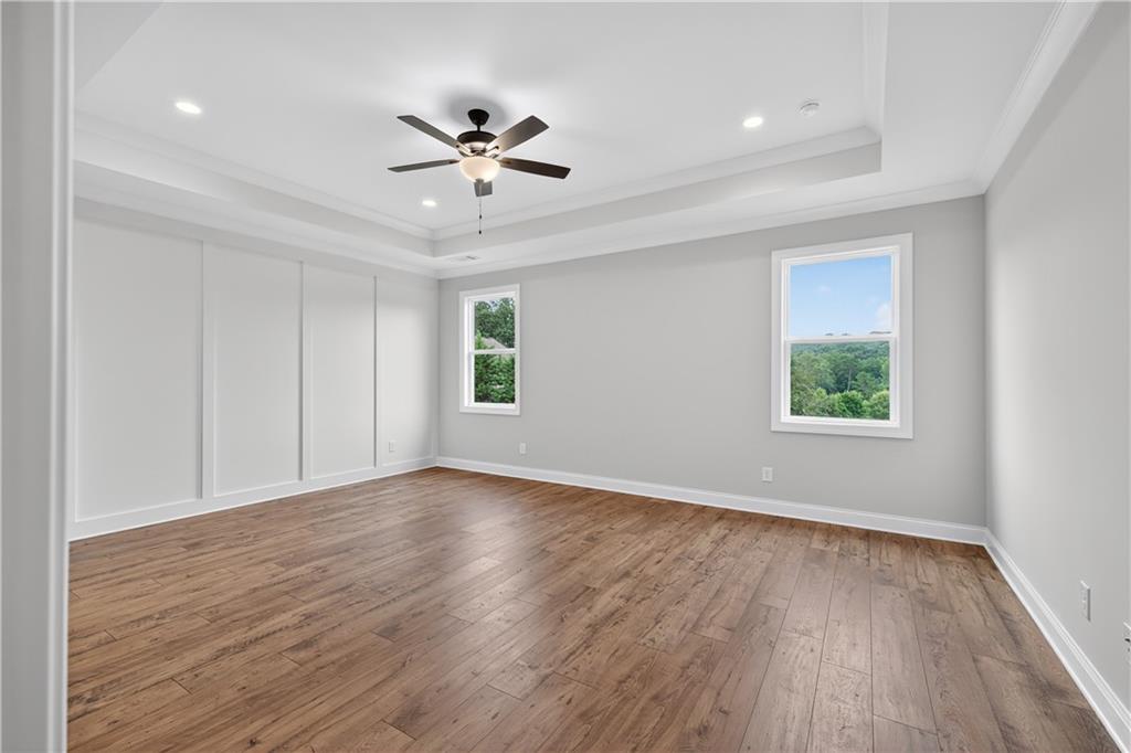 3787 Cheyenne Lane Jefferson, GA 30549 - Photo 39 of 82 a view of an empty room with wooden floor and a window