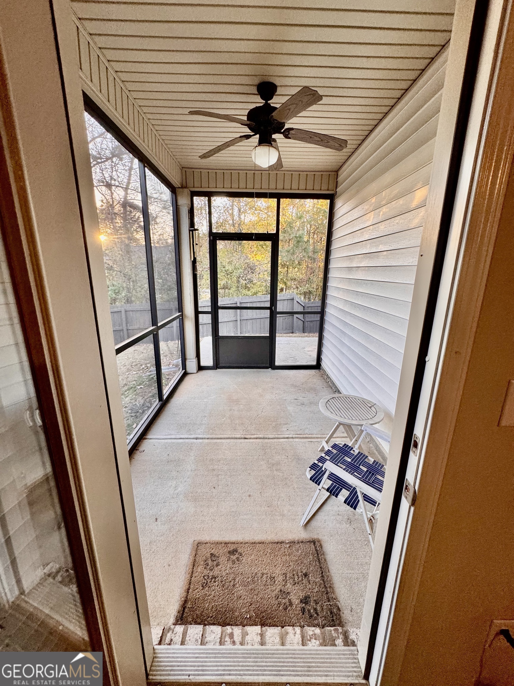 52 Pulaski Avenue Hampton, GA 30228 - Photo 30 of 32 a view of a hallway with a window