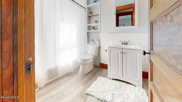 a bathroom with a sink and a toilet