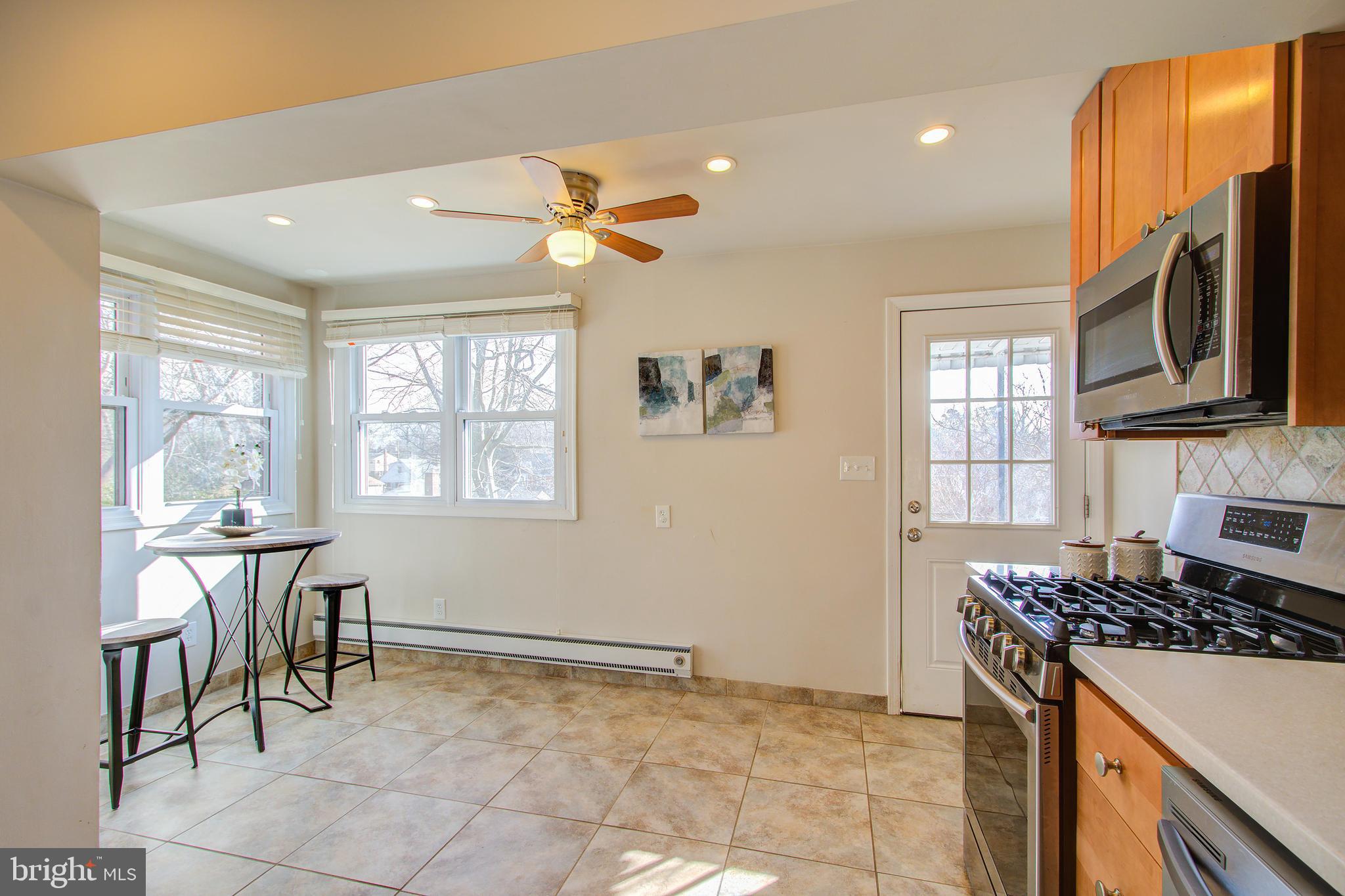10025 Dallas Avenue Silver Spring, MD 20901 - Photo 12 of 35 Light and bright kitchen with access to rear yard.
