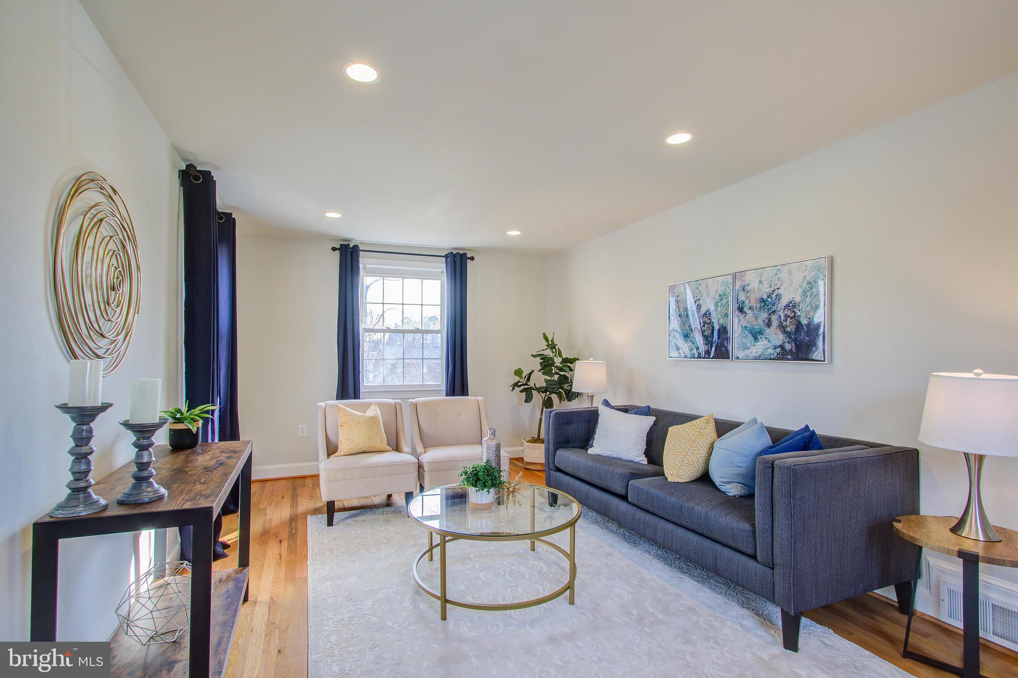 Wood floors throughout main and upper levels