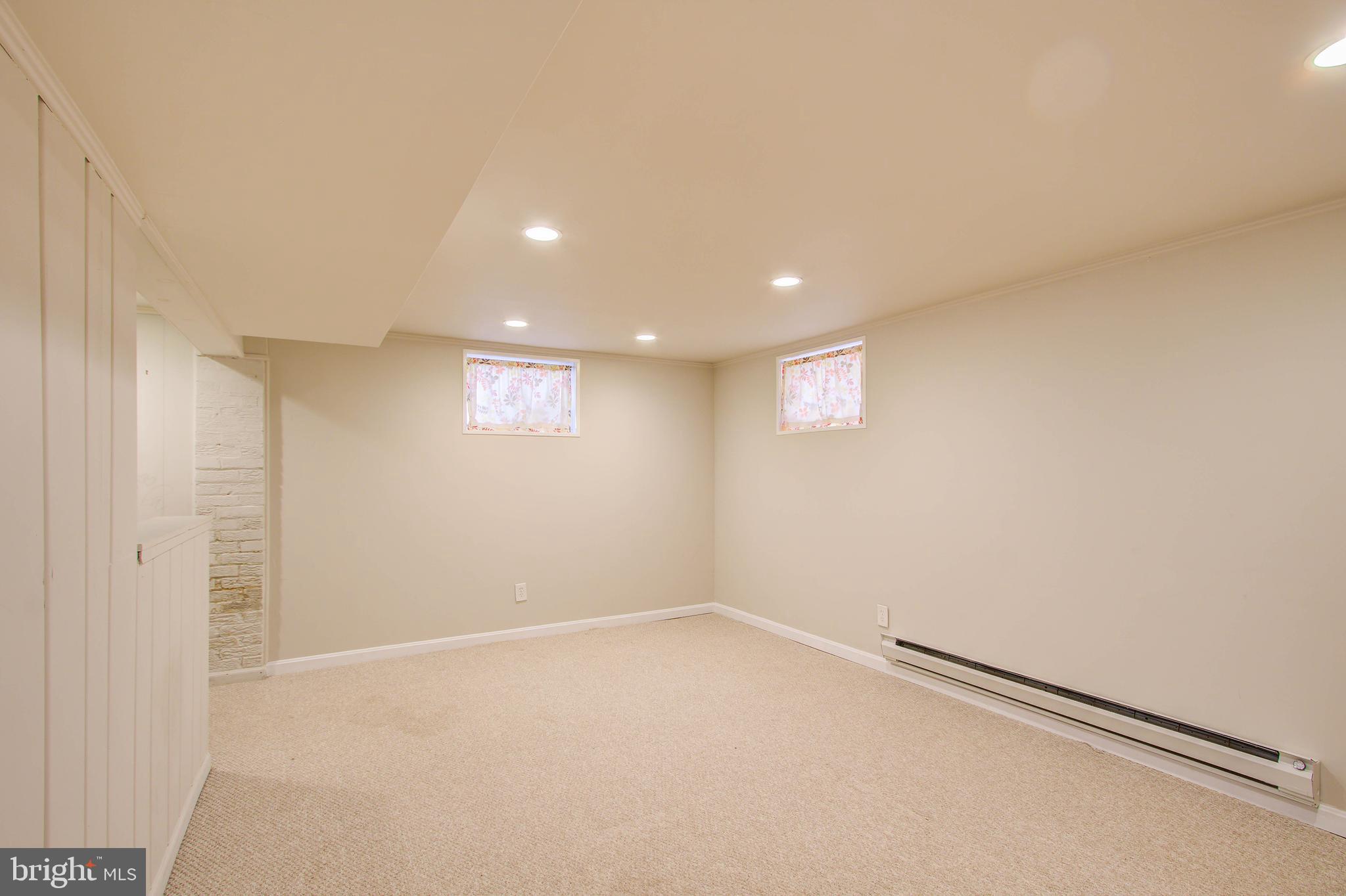 10025 Dallas Avenue Silver Spring, MD 20901 - Photo 25 of 35 Lower level recreation room