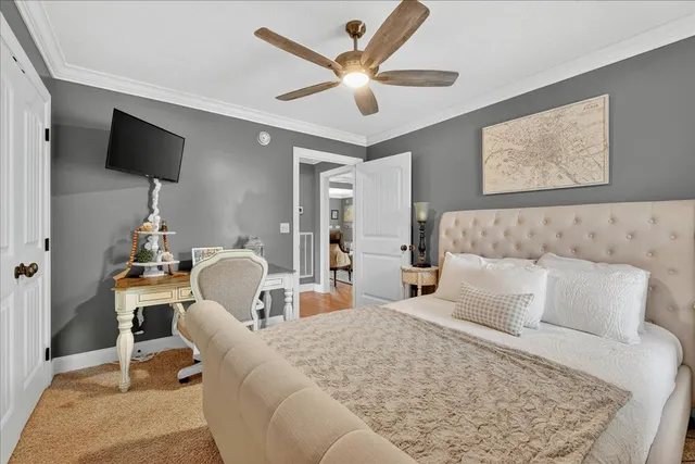 a view of a livingroom with furniture and a flat screen tv