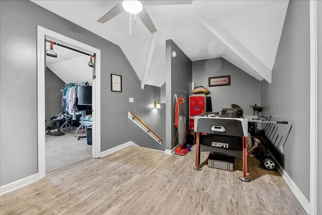 a view of a lounge chair in the back yard of the house